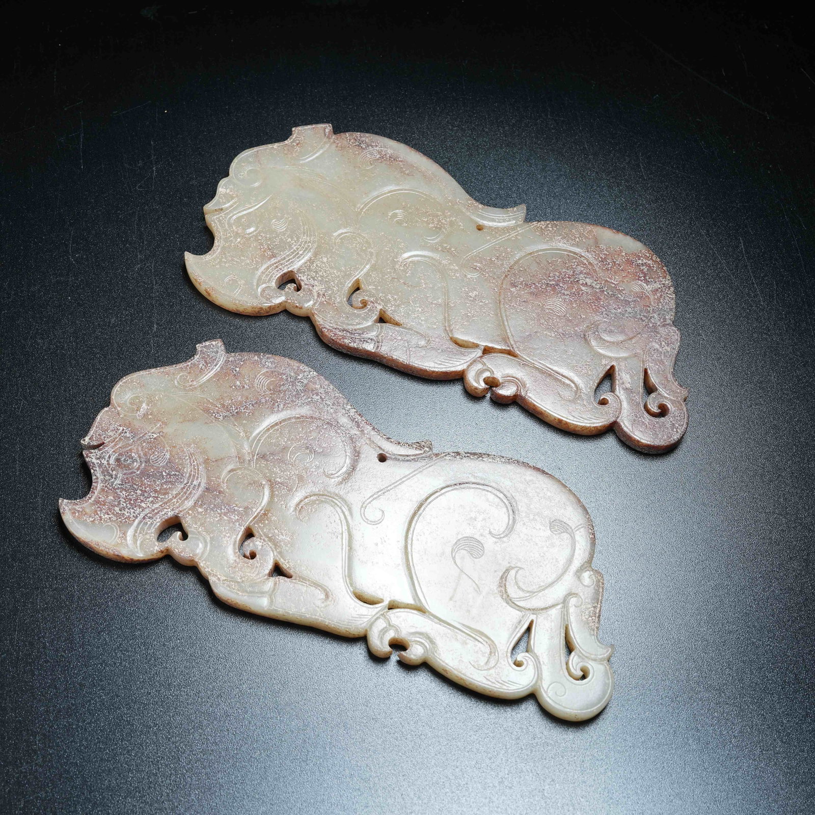 A SET OF ANCIENT JADE BEAST-SHAPED PENDANTS: Set of Ancient Jade Beast-shaped Pendants
