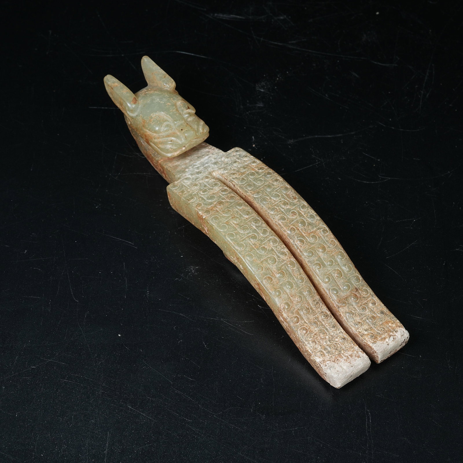 A ARCHAIC JADE BELT BUCKLE WITH BEAST HEAD: Archaic Jade Belt Buckle with Beast Head