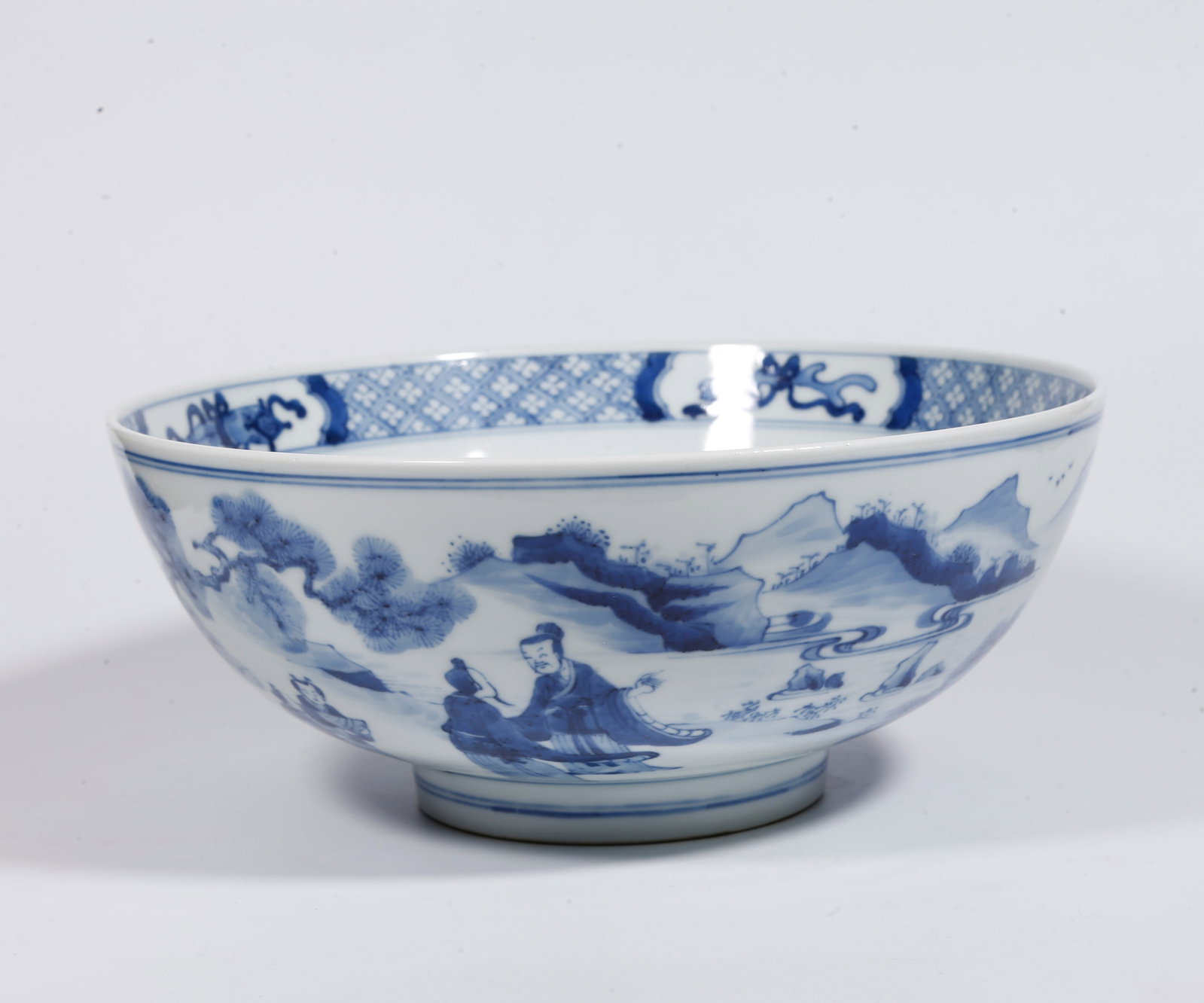 A BLUE AND WHITE UNDERGLAZE RED BOWL WITH LANDSCAPE AND FIGURE PATTERN: Blue and White Underglaze Red Bowl with Landscape and Figure Pattern