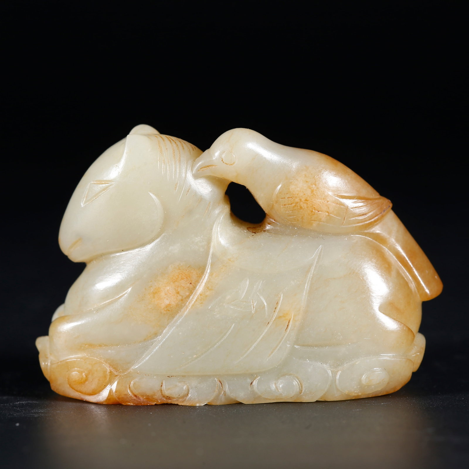 A HETIAN JADE CARVED BEAST ORNAMENT (1 of 9)