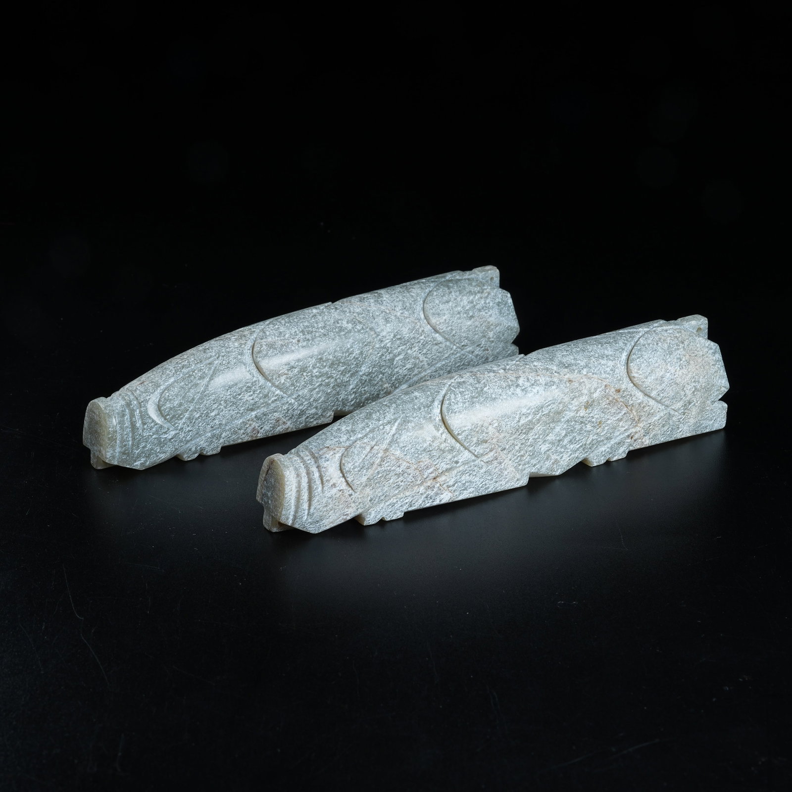 A SET OF ARCHAIC JADE HAND GRIPS: Set of Archaic Jade Hand Grips