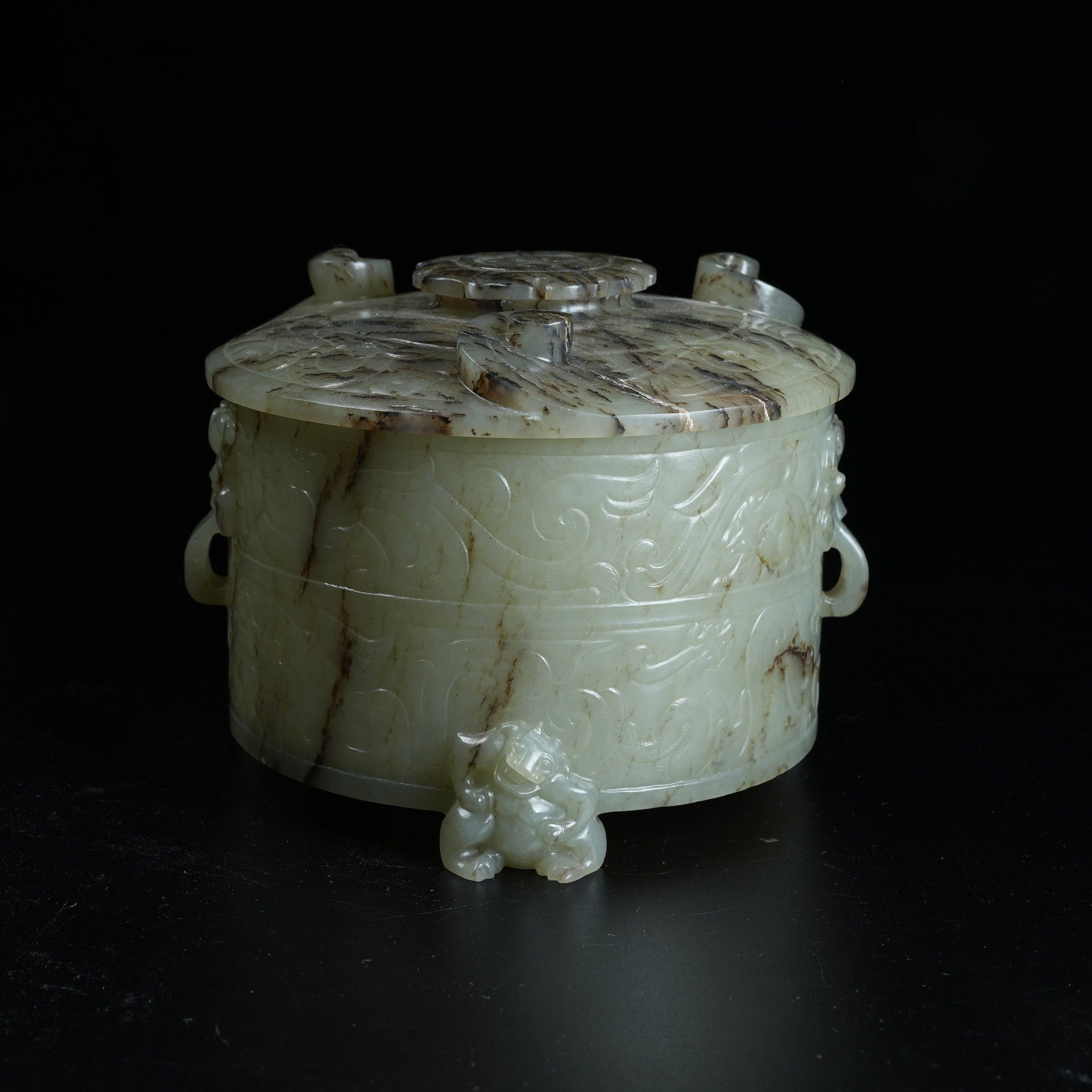 A ARCHAIC JADE SLANTED CUP WITH DRAGON PATTERN: Archaic Jade Slanted Cup with Dragon Pattern