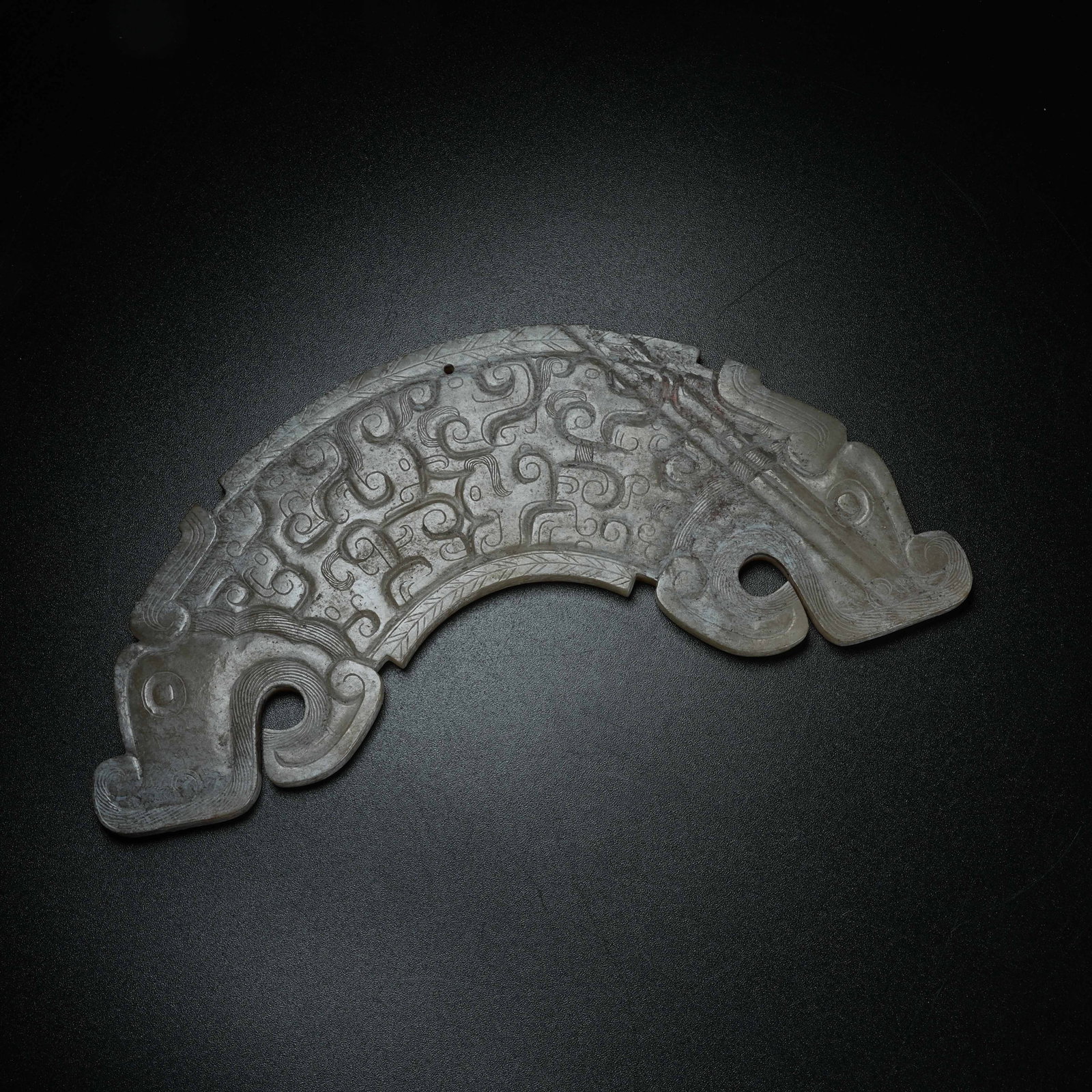 A ARCHAIC JADE HUANG ARC WITH BEAST HEAD: Archaic Jade Huang Arc with Beast Head