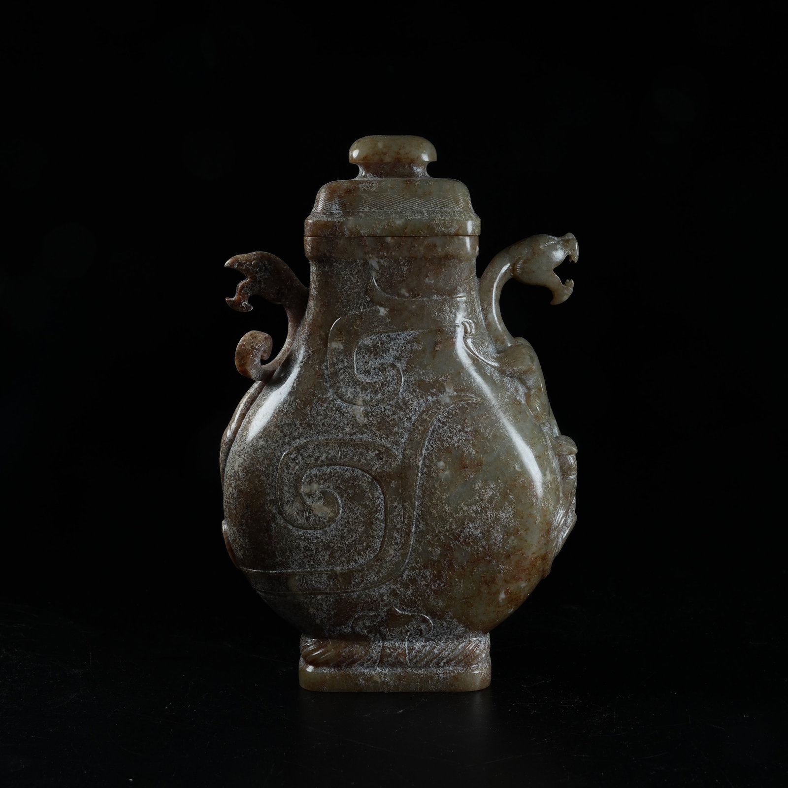 A ARCHAIC JADE COVERED VASE WITH CHI DRAGON EARS: Archaic Jade Covered Vase with Chi Dragon Ears