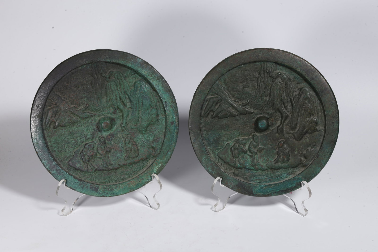A PAIR OF BRONZE MIRRORS WITH LANDSCAPE AND FIGURE PATTERN (1 of 9)