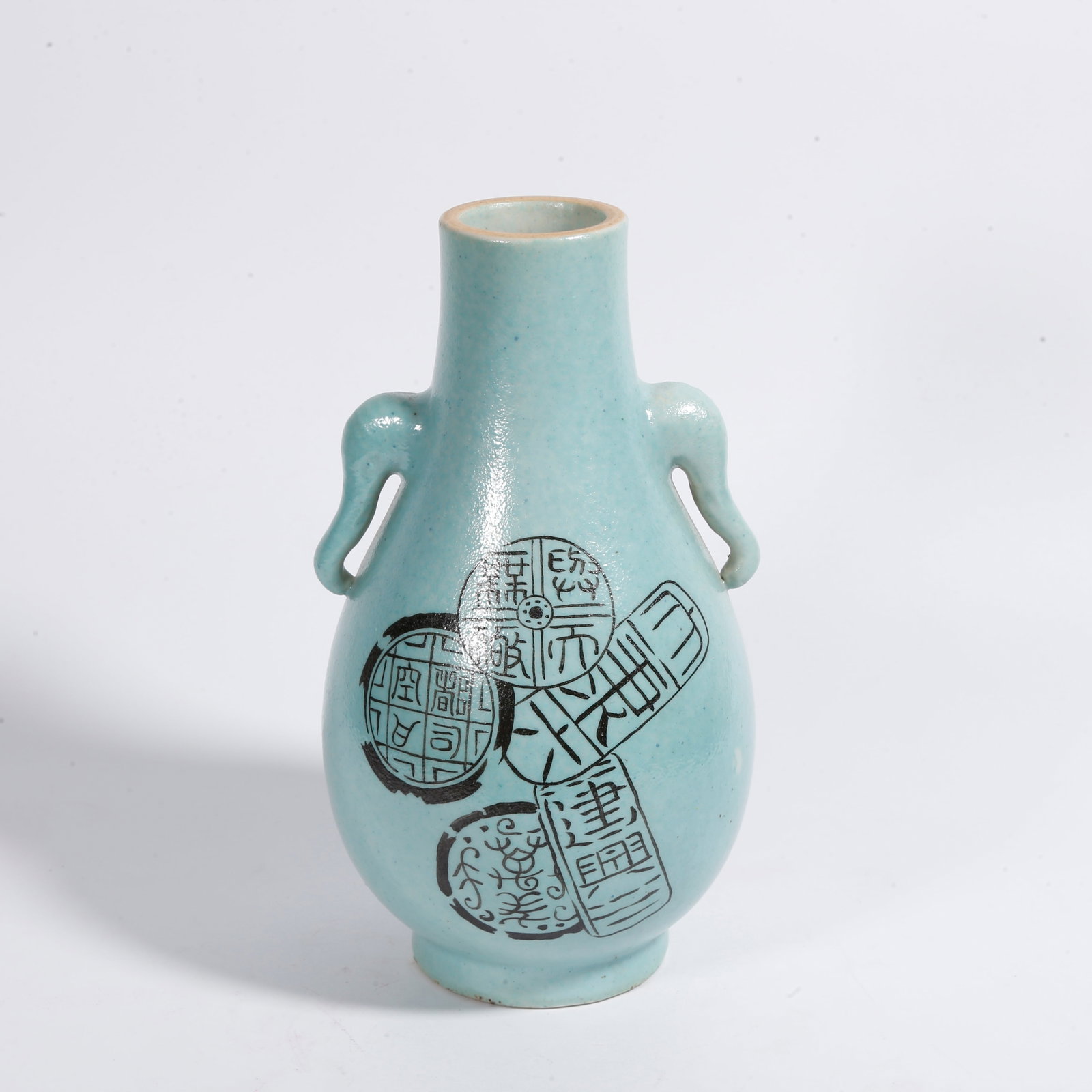 A PEACOCK BLUE GLAZE VASE WITH ELEPHANT HANDLES (1 of 9)