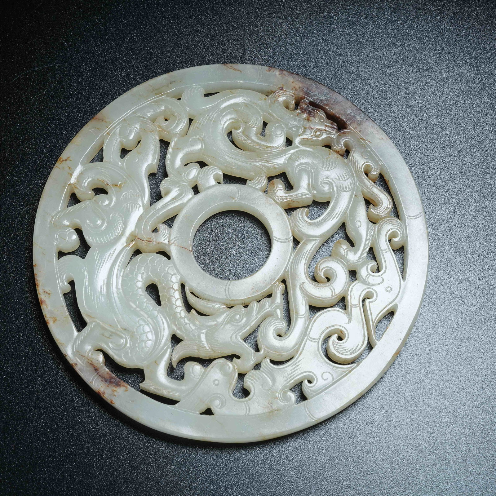 A ANCIENT JADE BI DISC WITH CHI DRAGON PATTERNS: Ancient Jade Bi Disc with Chi Dragon Patterns