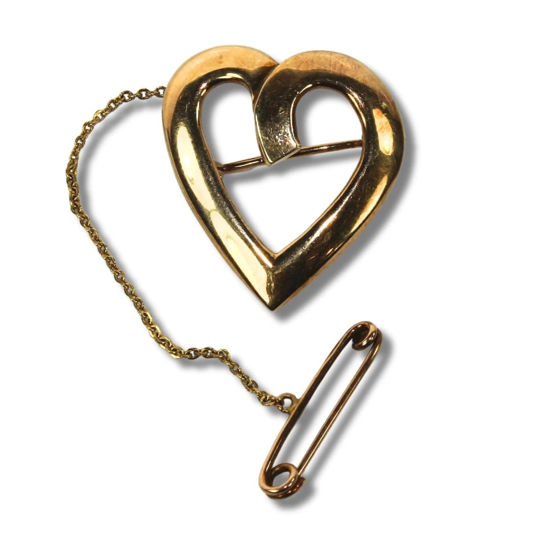 HEART-SHAPED BROOCH IN 10CT YELLOW GOLD WITH SAFETY CHAIN: Heart-shaped Brooch in 10ct Yellow Gold with safety chain