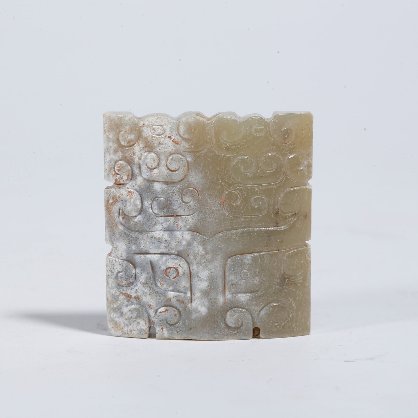 A ARCHAIC JADE PENDANT WITH BEAST MASK PATTERN: Archaic Jade Pendant with Beast Mask Pattern