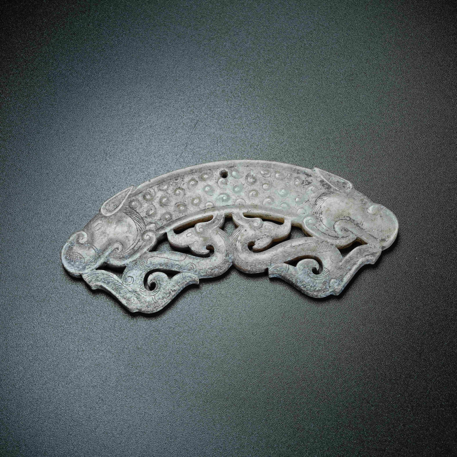 A ARCHAIC JADE HUANG ARC WITH BEAST MASK PATTERN: Archaic Jade Huang Arc with Beast Mask Pattern