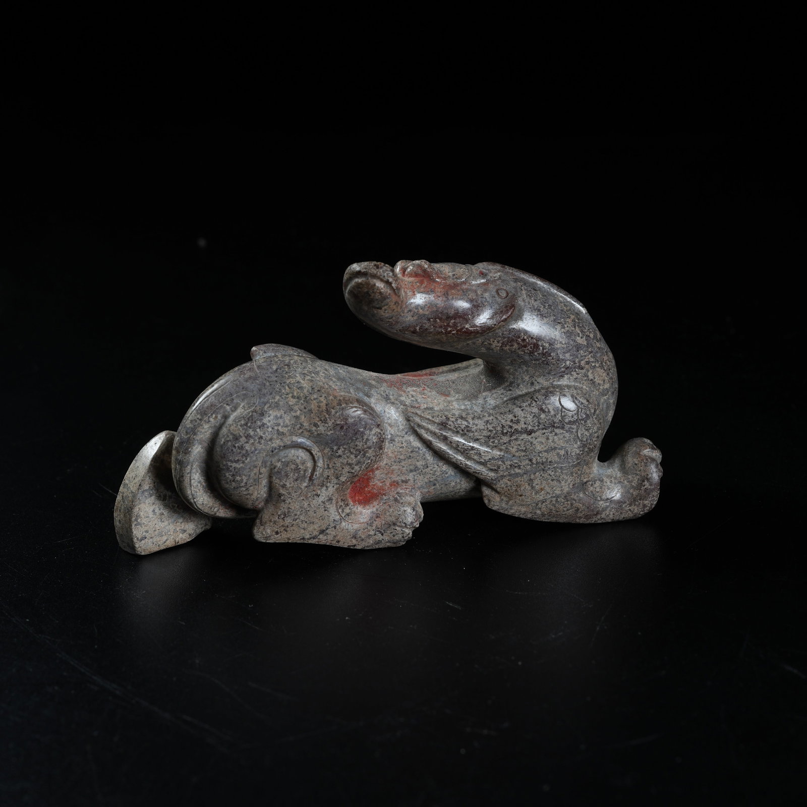 A ARCHAIC JADE ORNAMENT OF TURNING-BACK BEAST: Archaic Jade Ornament of Turning-back Beast