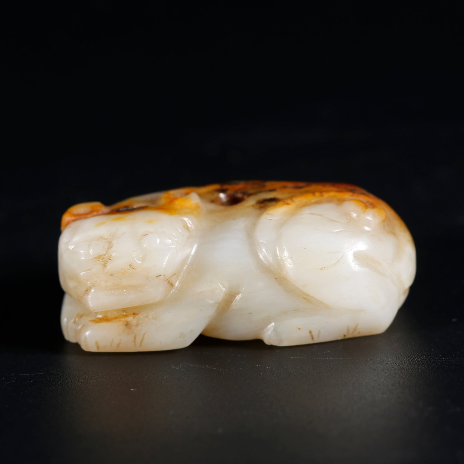 A HETIAN JADE CARVED BEAST PENDANT (1 of 10)