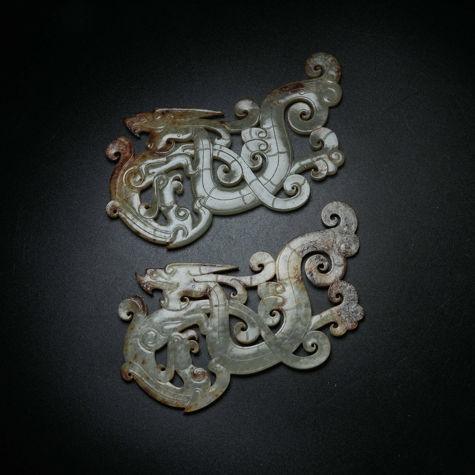 A SET OF ARCHAIC JADE PENDANTS WITH DRAGON PATTERN: Set of Archaic Jade Pendants with Dragon Pattern