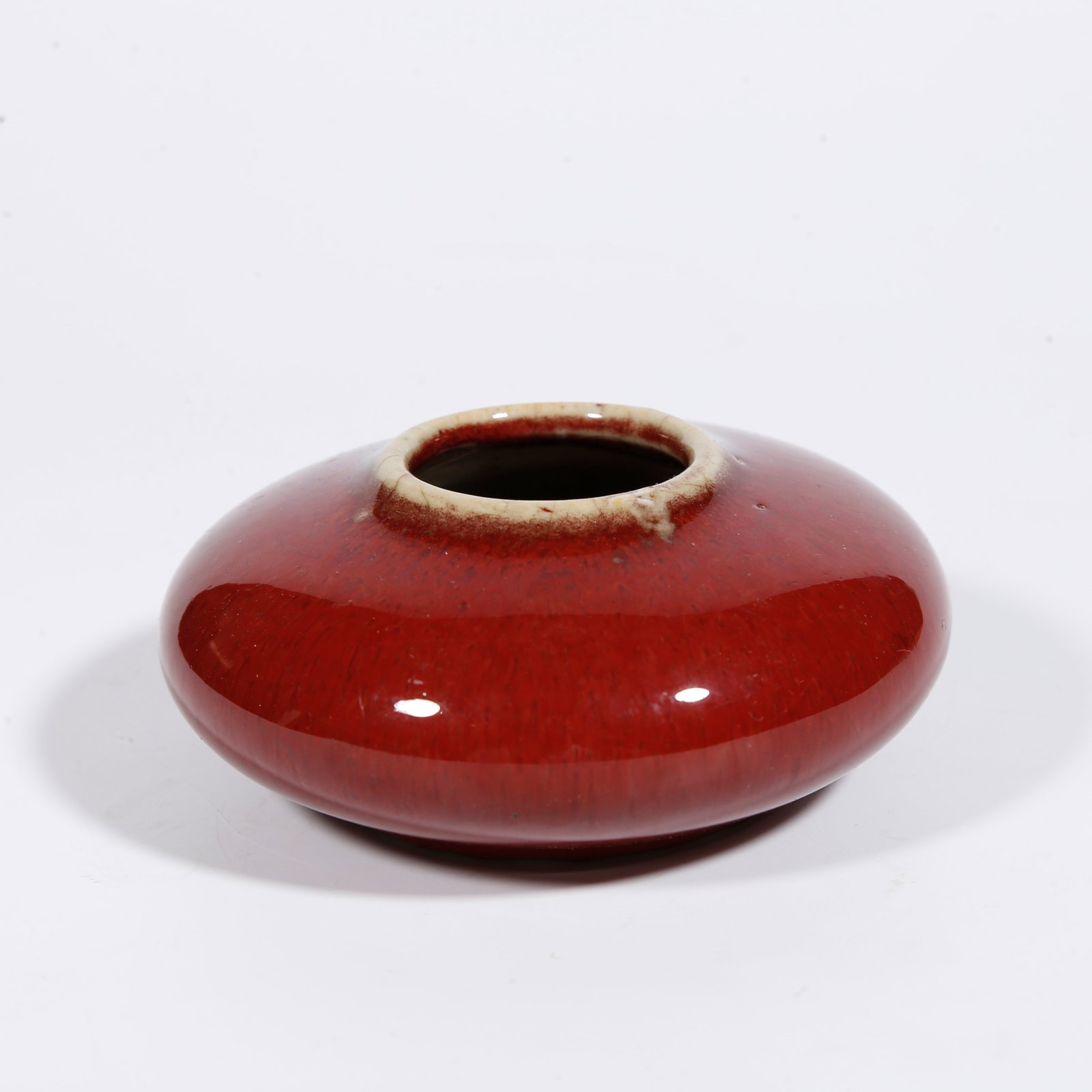 A RED GLAZE WATER POT: Red Glaze Water Pot
