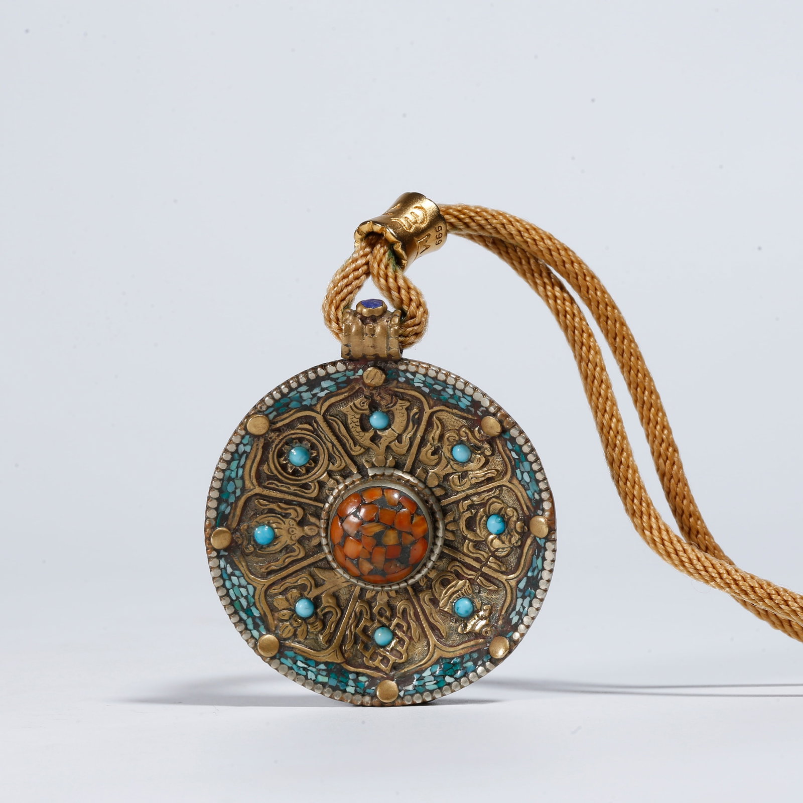 A BRONZE PLAQUE INLAID WITH TURQUOISE (1 of 8)