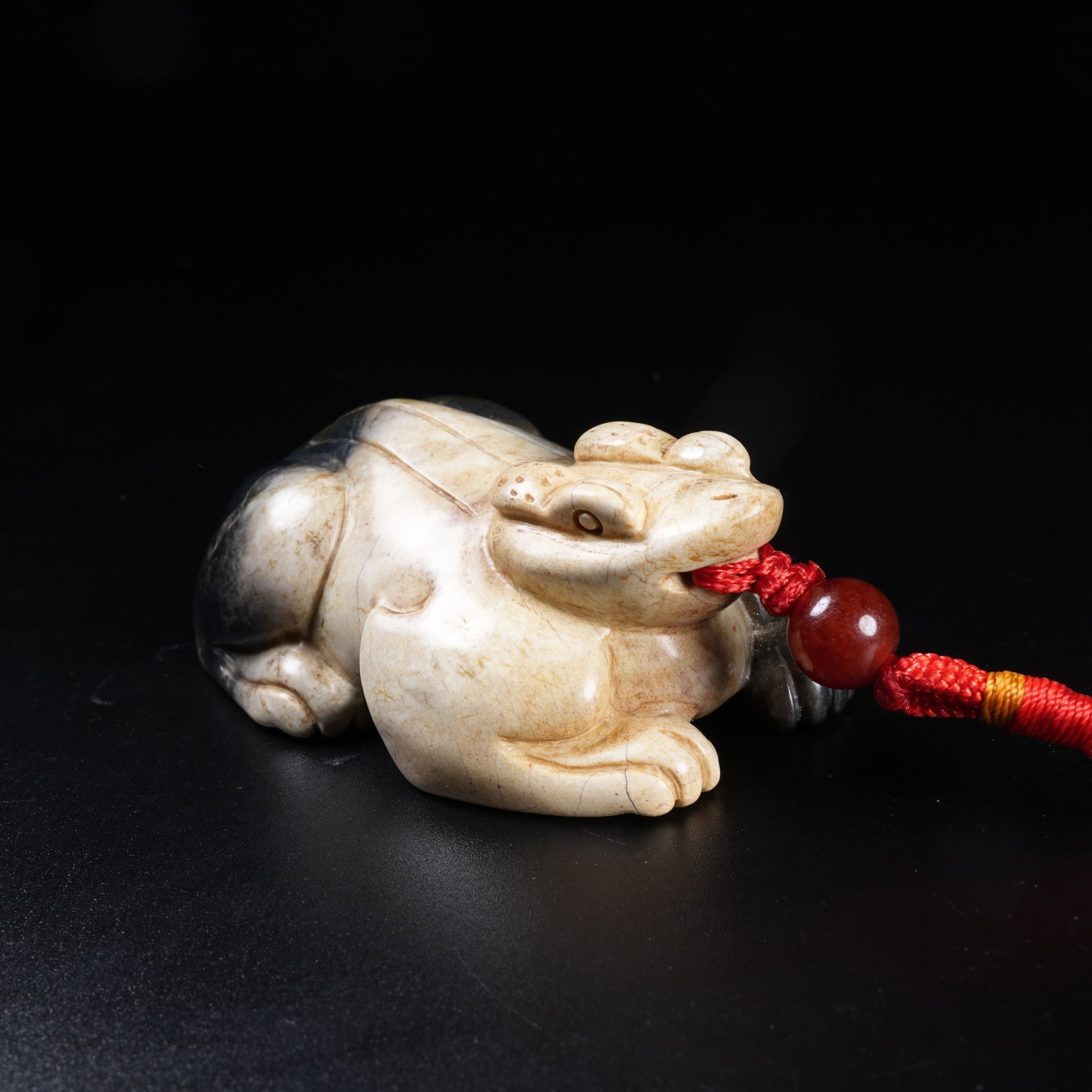 A ARCHAIC JADE BEAST PENDANT: Archaic Jade Beast Pendant