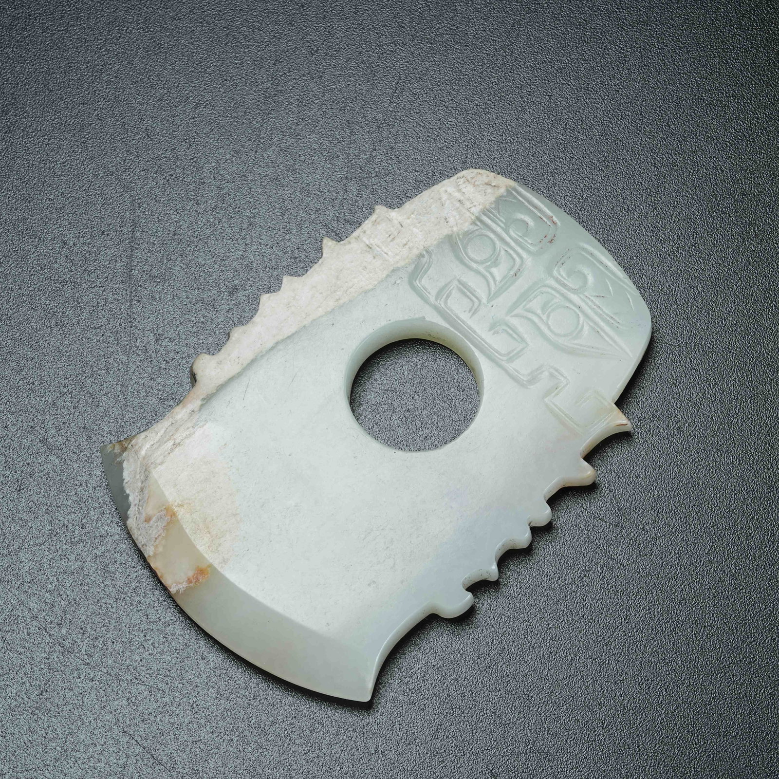 A ANCIENT JADE AXE WITH BEAST MASK PATTERN: Ancient Jade Axe with Beast Mask Pattern