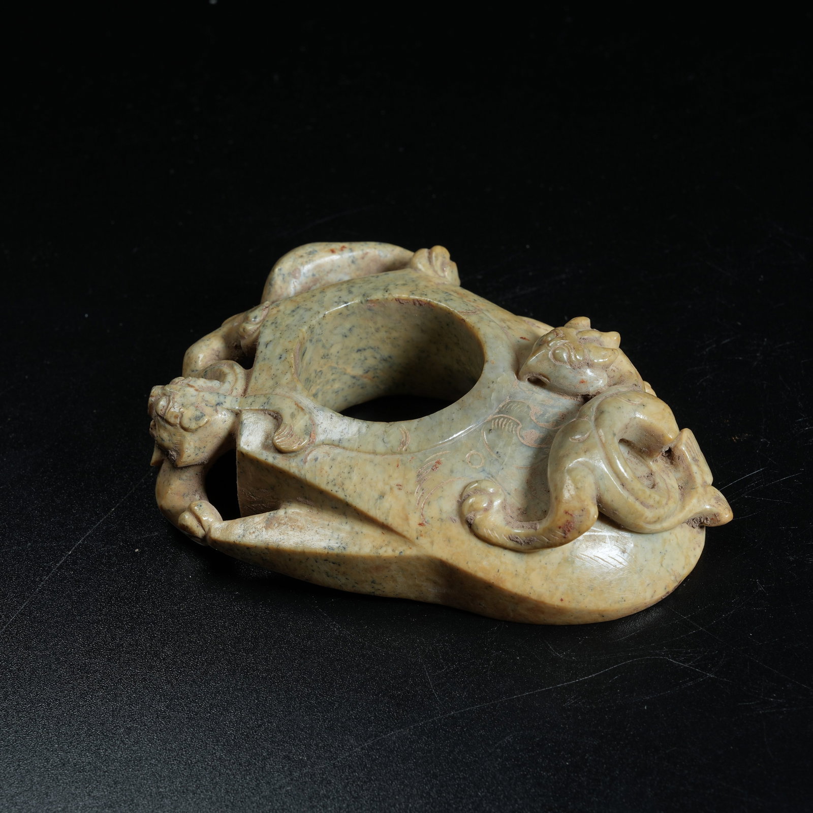 A ANCIENT JADE HEART-SHAPED PENDANT CARVED WITH CHI DRAGON PATTERNS: Ancient Jade Heart-shaped Pendant Carved with Chi Dragon Patterns