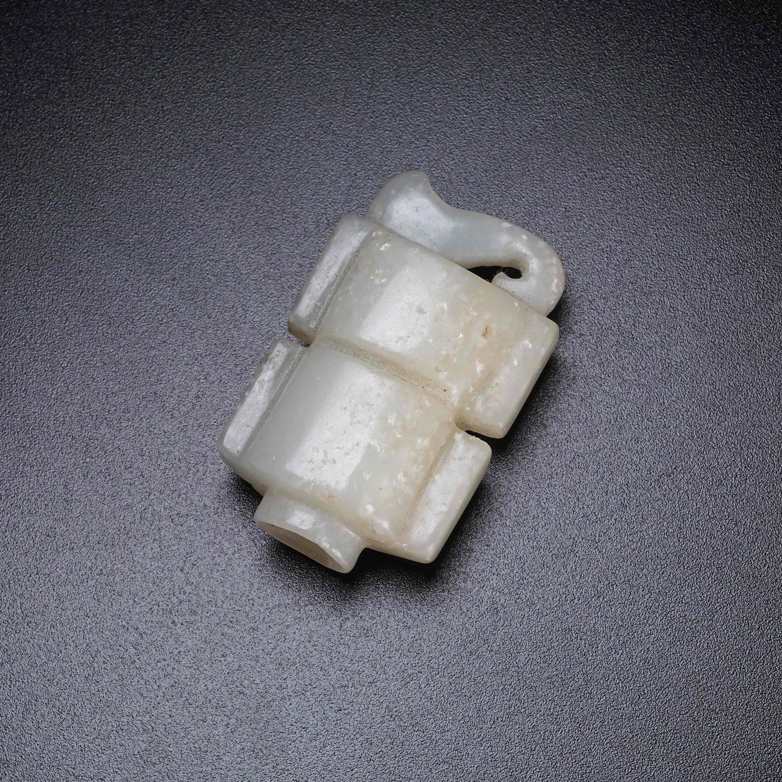 A ARCHAIC JADE SINAN PENDANT: Archaic Jade Sinan Pendant