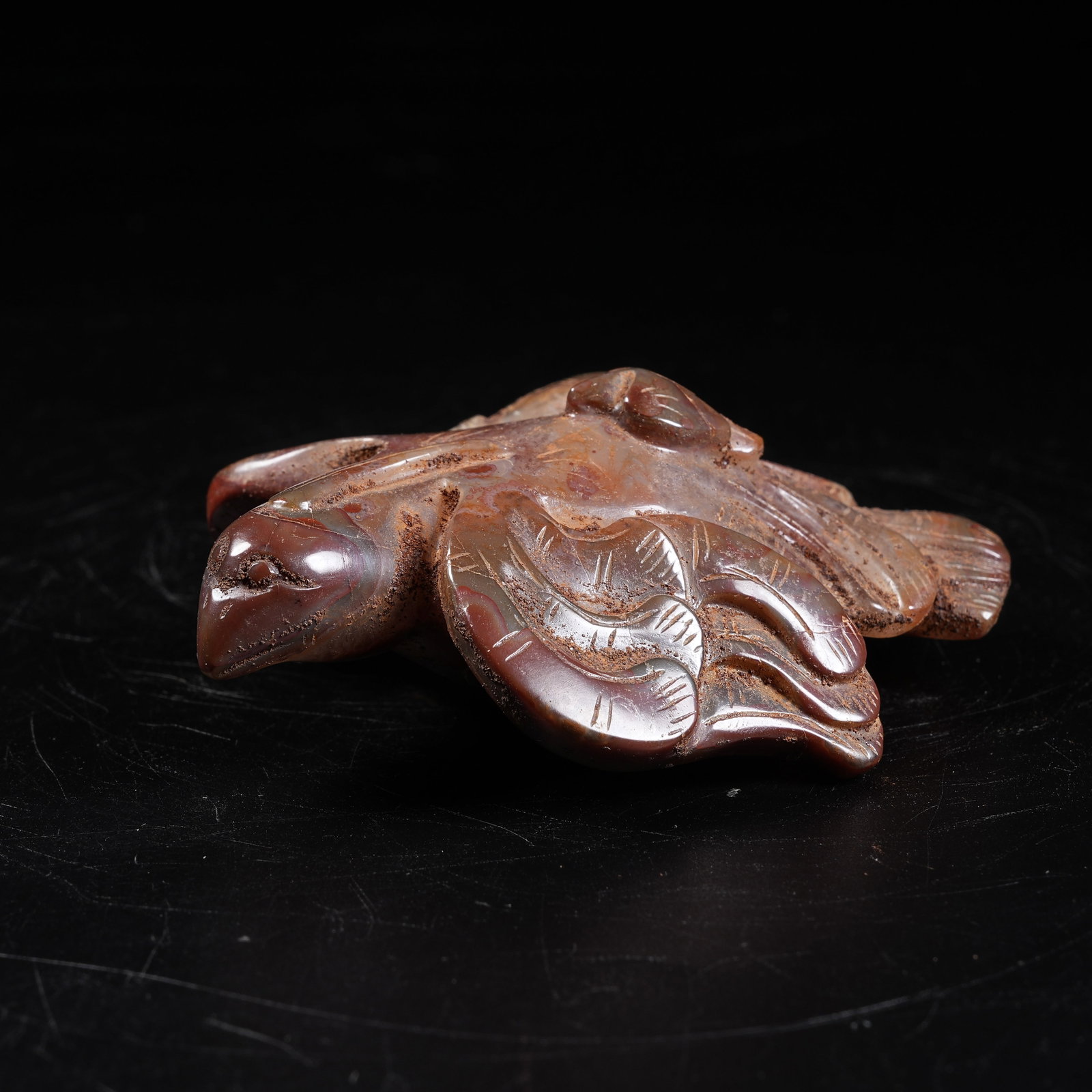A WARRING STATES RED AGATE PHOENIX ORNAMENT (1 of 7)
