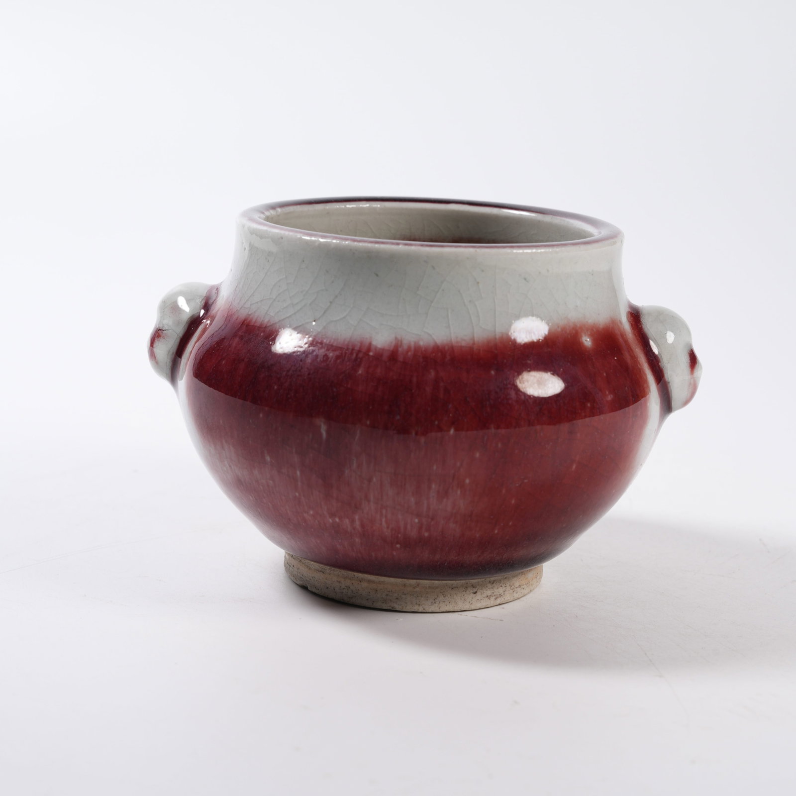 A LANGYAO RED GLAZED CENSER WITH BEAST HANDLES: Langyao Red Glazed Censer with Beast Handles