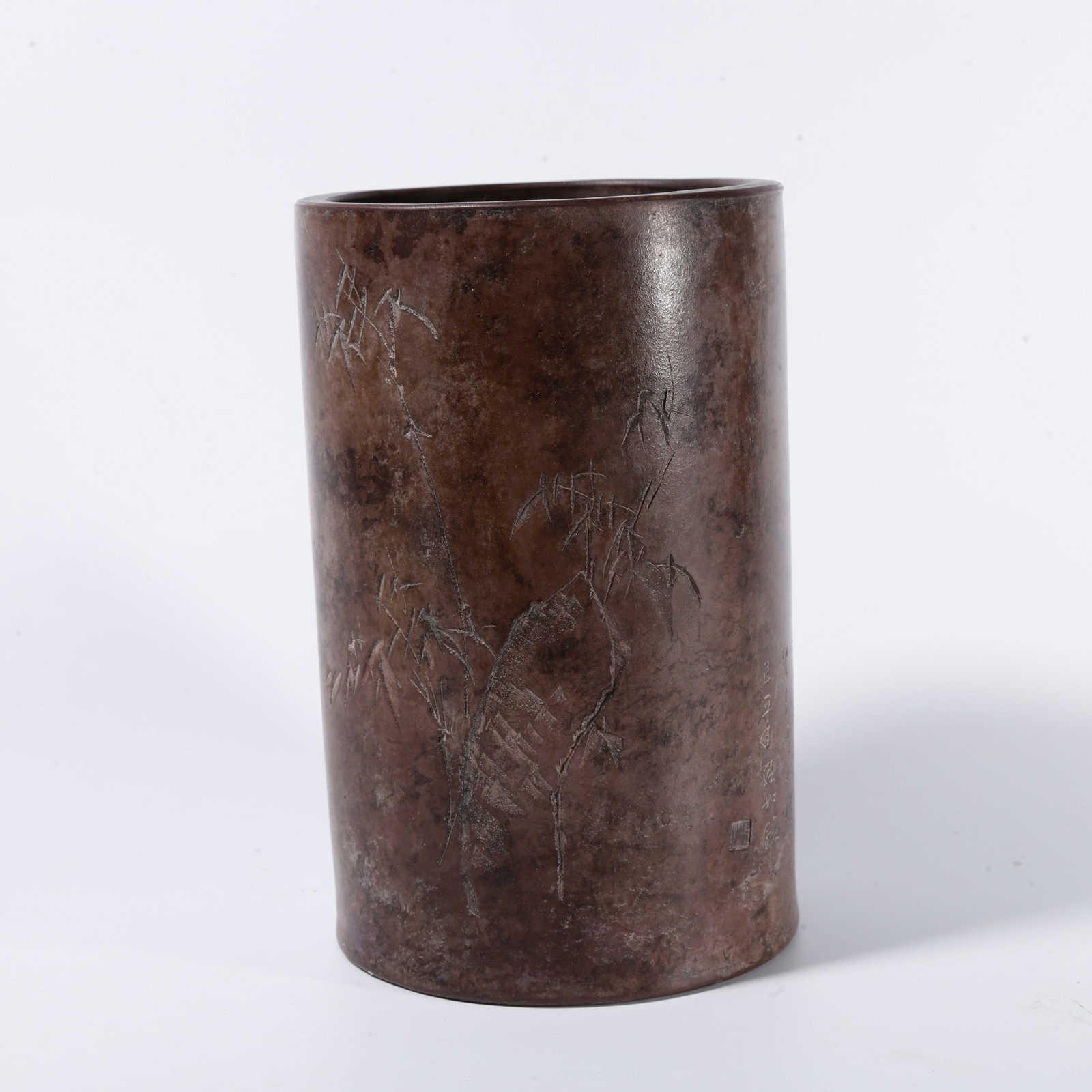 A ZISHA BRUSH POT CARVED WITH BAMBOO?AND?ROCK PATTERN: Zisha brush pot carved with bamboo?and?rock pattern