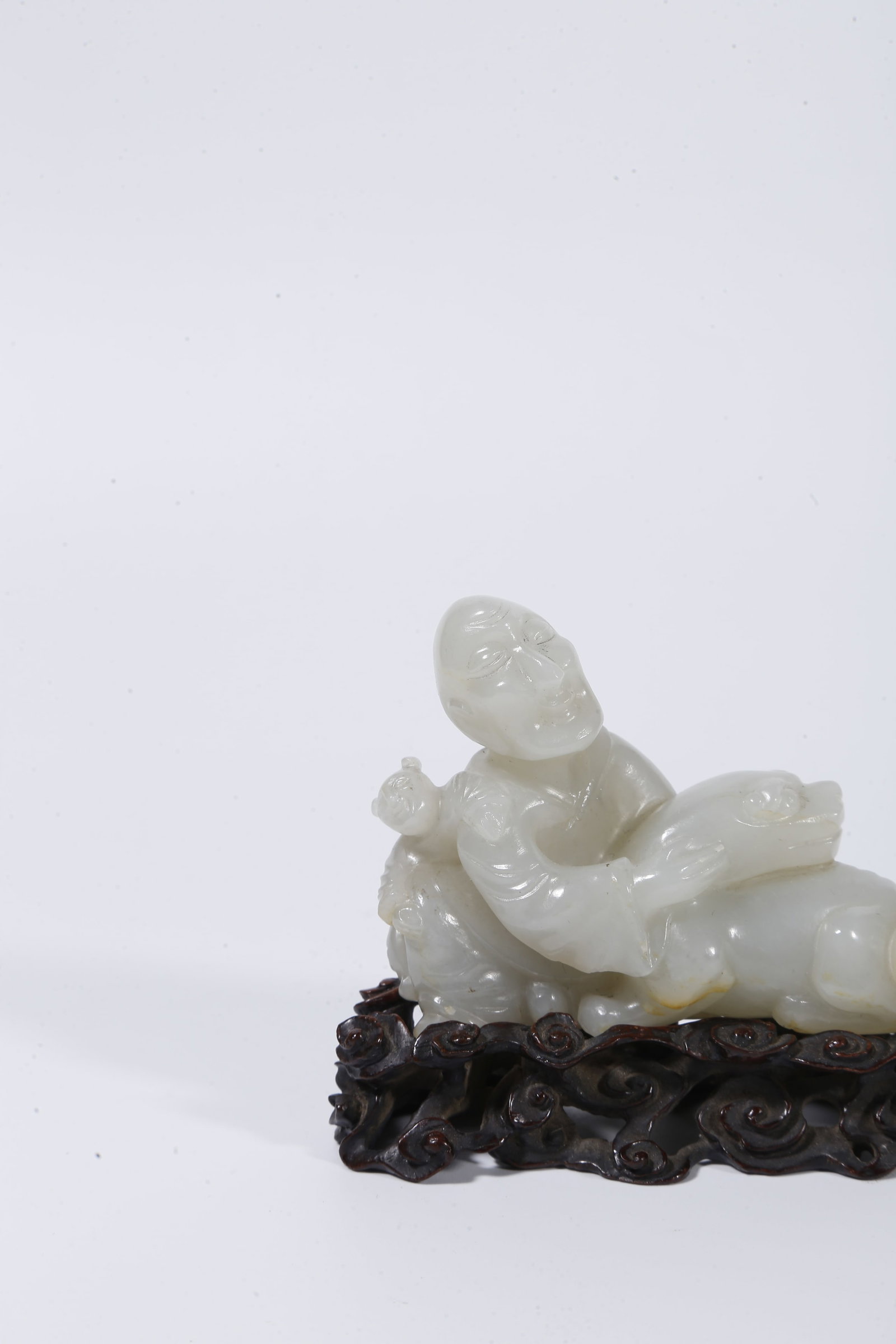 A HETIAN JADE CARVED ARHAT STATUE - 2