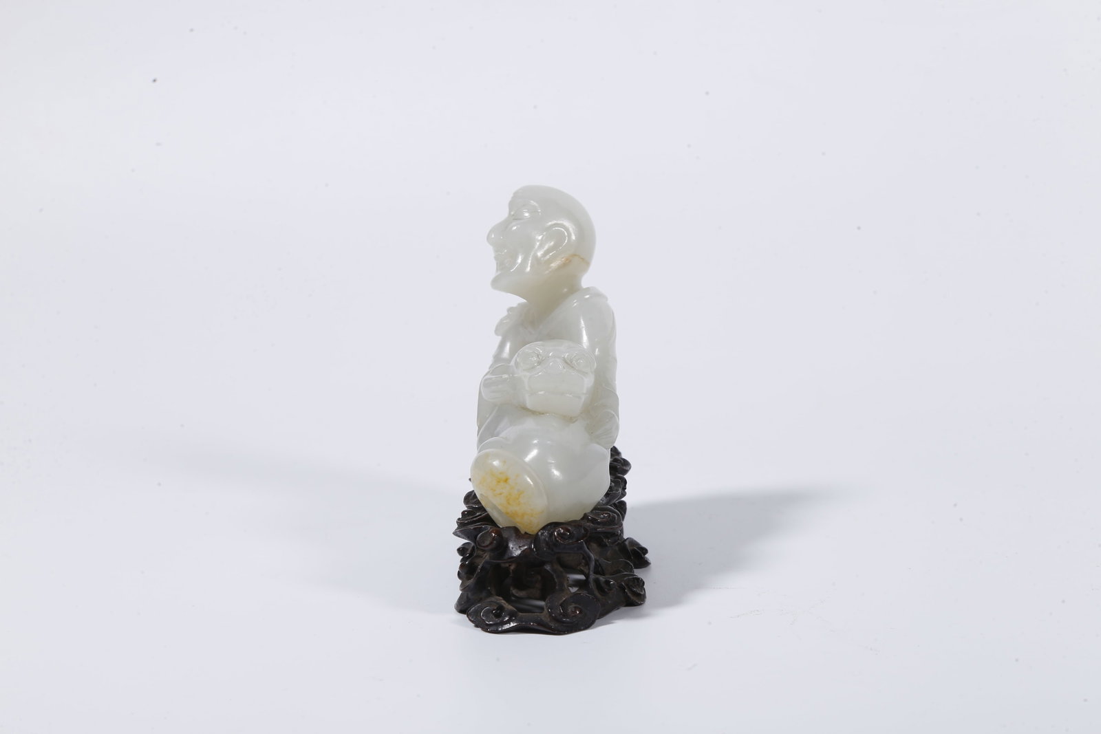 A HETIAN JADE CARVED ARHAT STATUE - 4