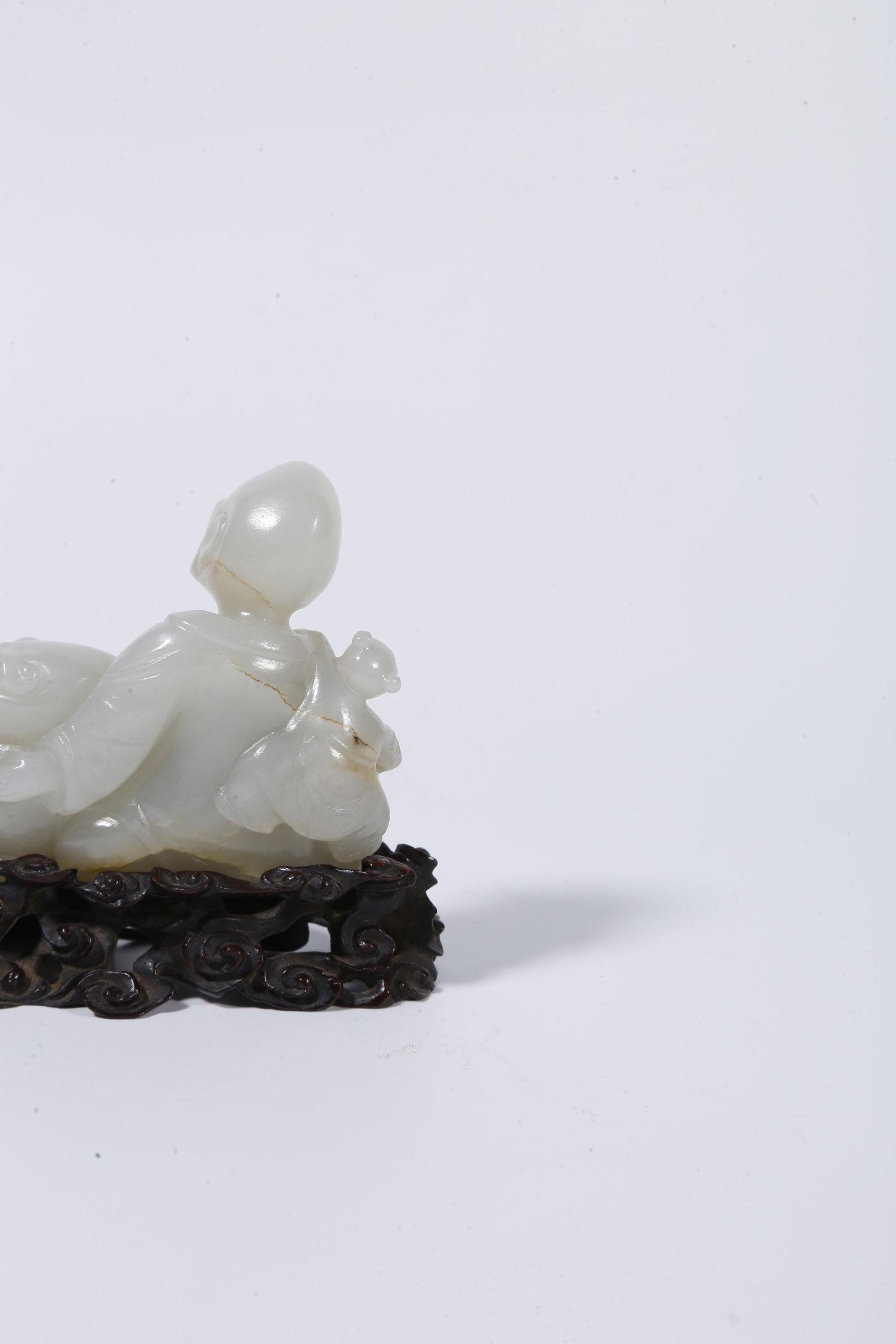 A HETIAN JADE CARVED ARHAT STATUE - 6