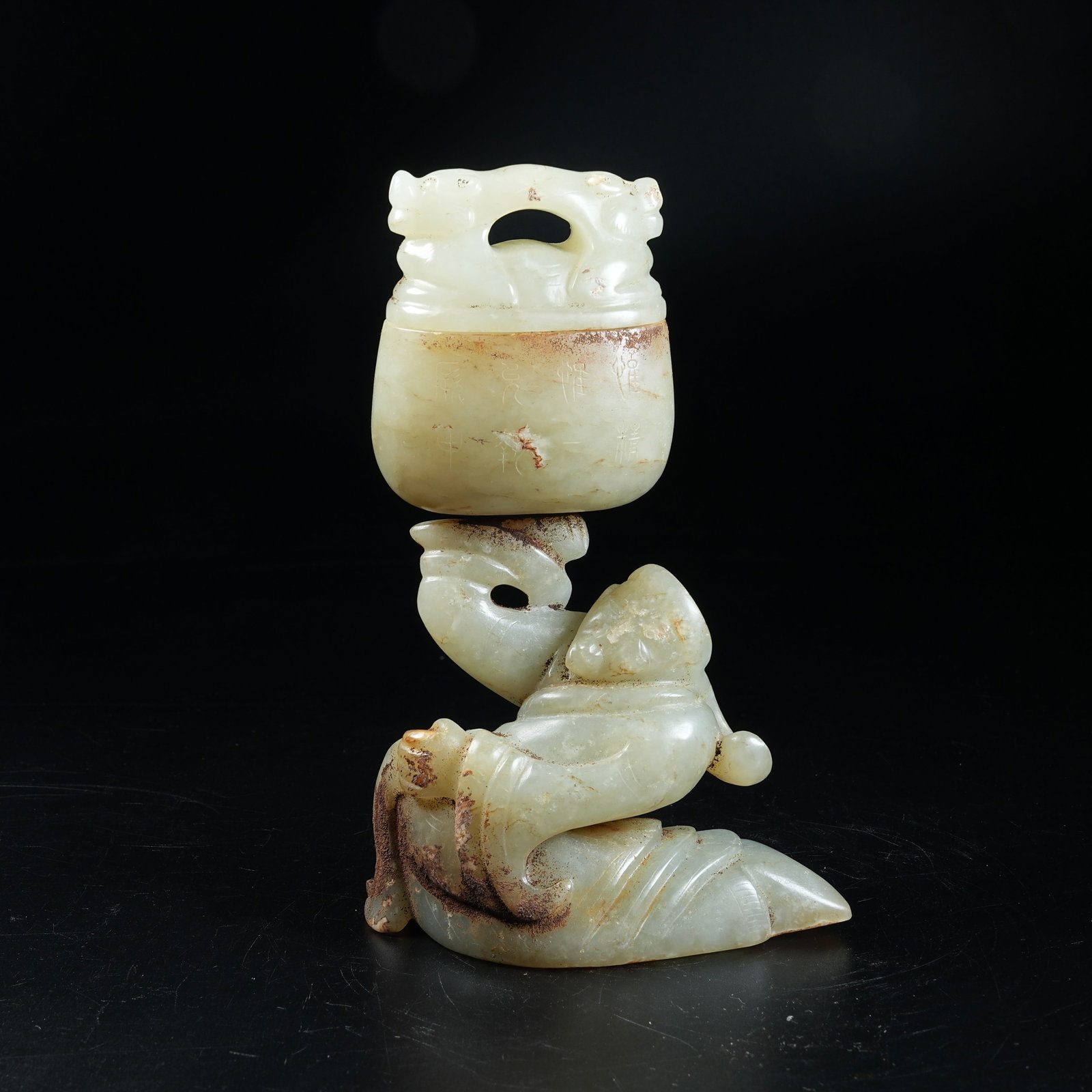 A ANCIENT JADE KNEELING FIGURE HOLDING CENSER ORNAMENT: Ancient Jade Kneeling Figure Holding Censer Ornament