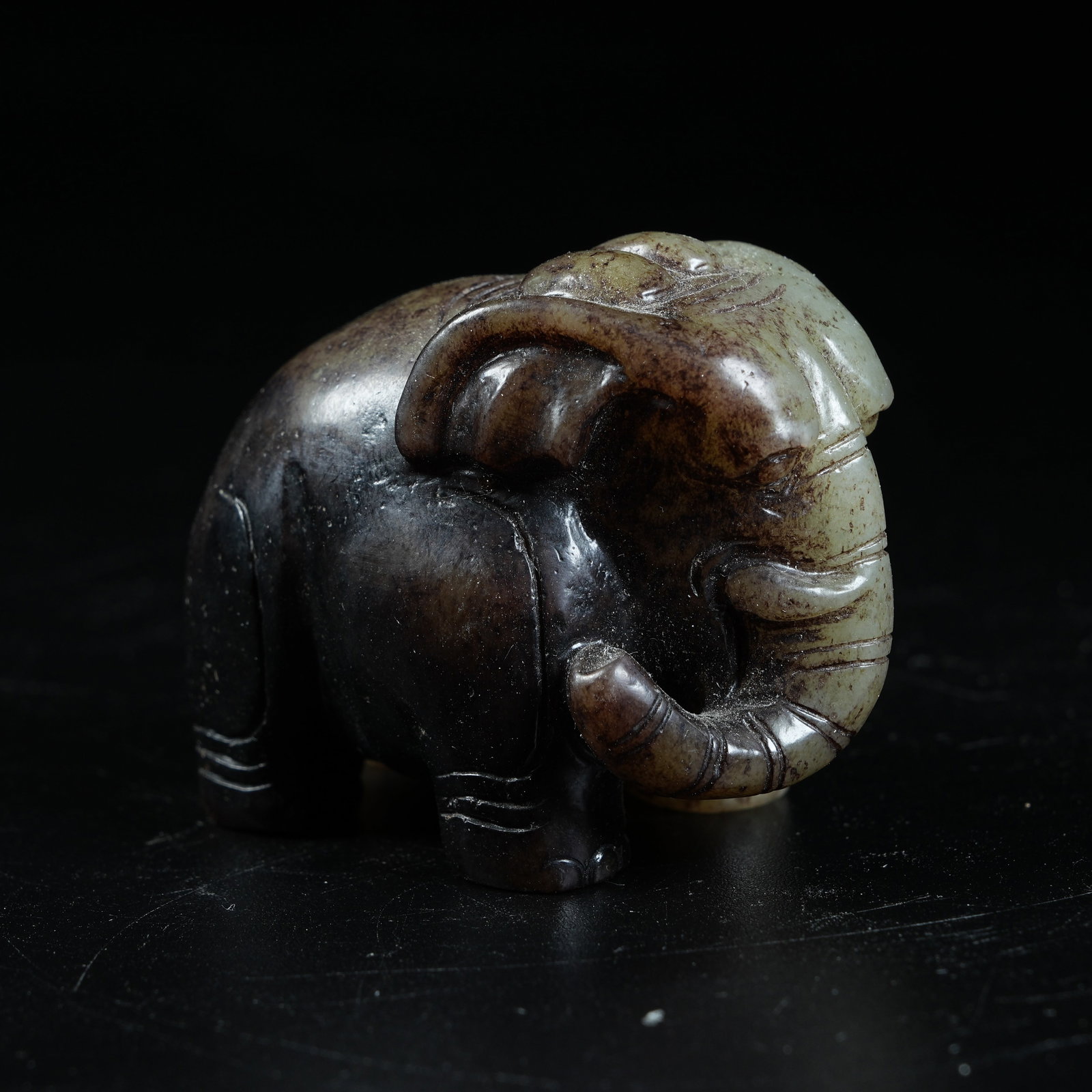 A ANCIENT JADE ORNAMENT OF ELEPHANT SYMBOLIZING PEACE: Ancient Jade Ornament of Elephant Symbolizing Peace