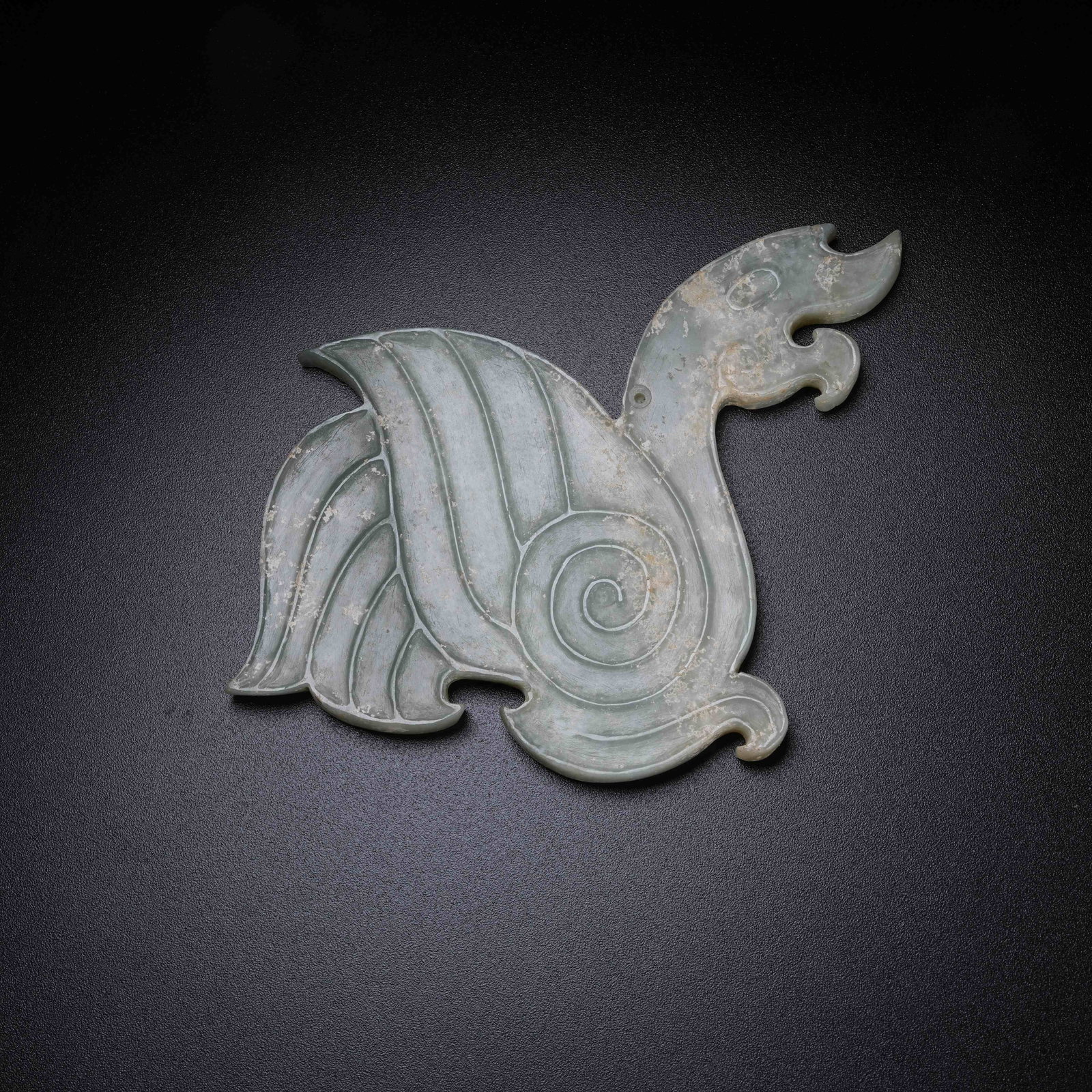 A ARCHAIC JADE PHOENIX PENDANT: Archaic Jade Phoenix Pendant