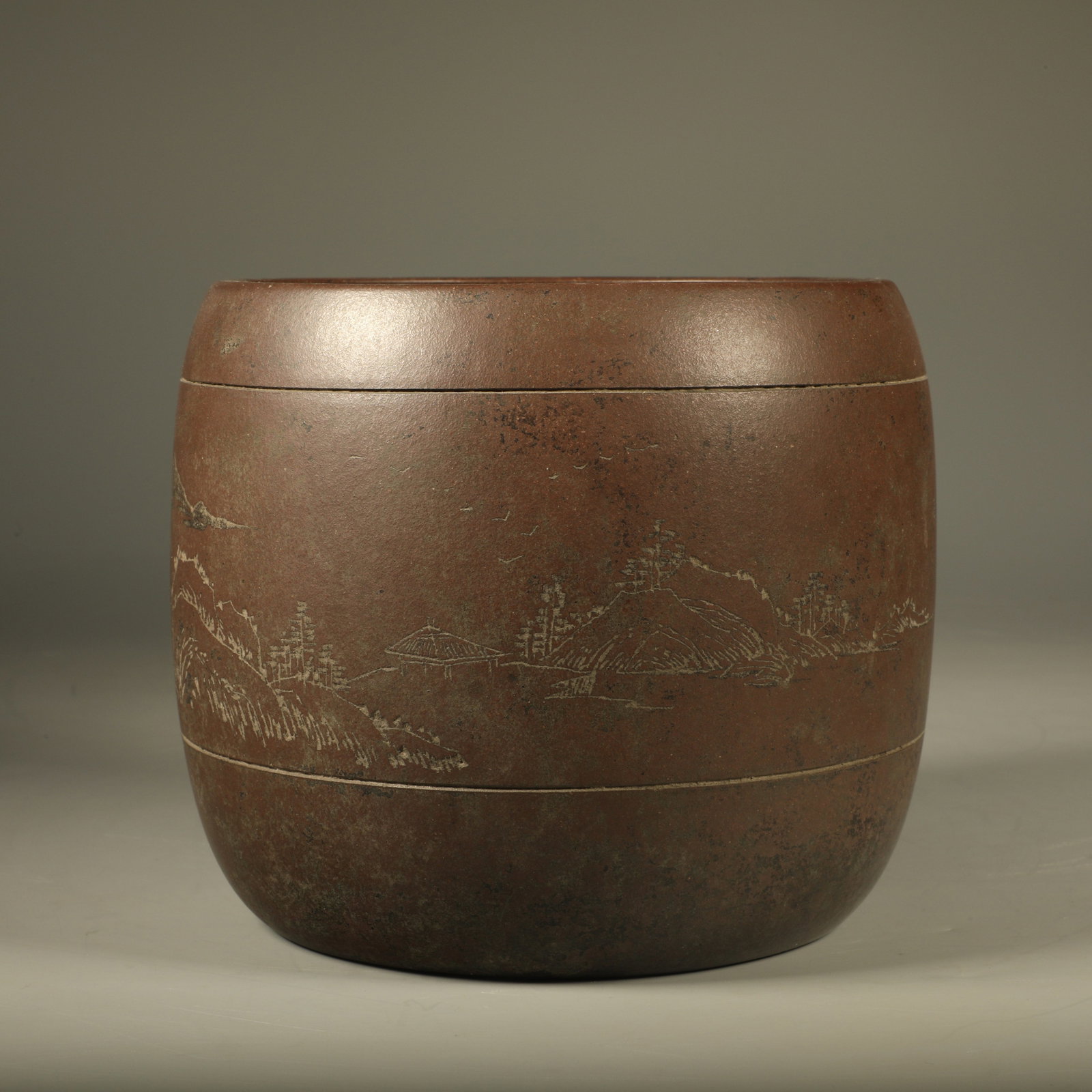 A YIXING ZISHA BRUSH POT CARVED WITH LANDSCAPES AND INSCRIBED VERSES: Yixing Zisha Brush Pot Carved with Landscapes and Inscribed Verses