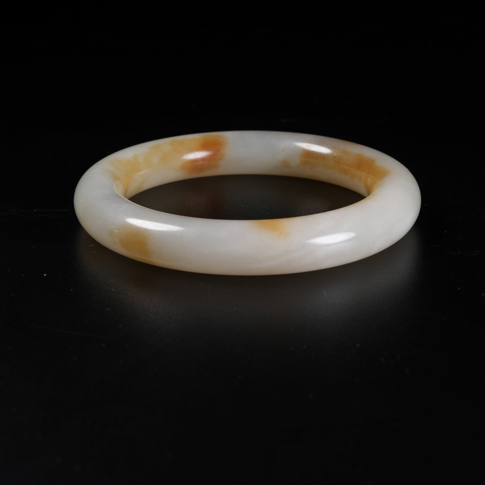 A HETIAN JADE BANGLE: Hetian Jade Bangle