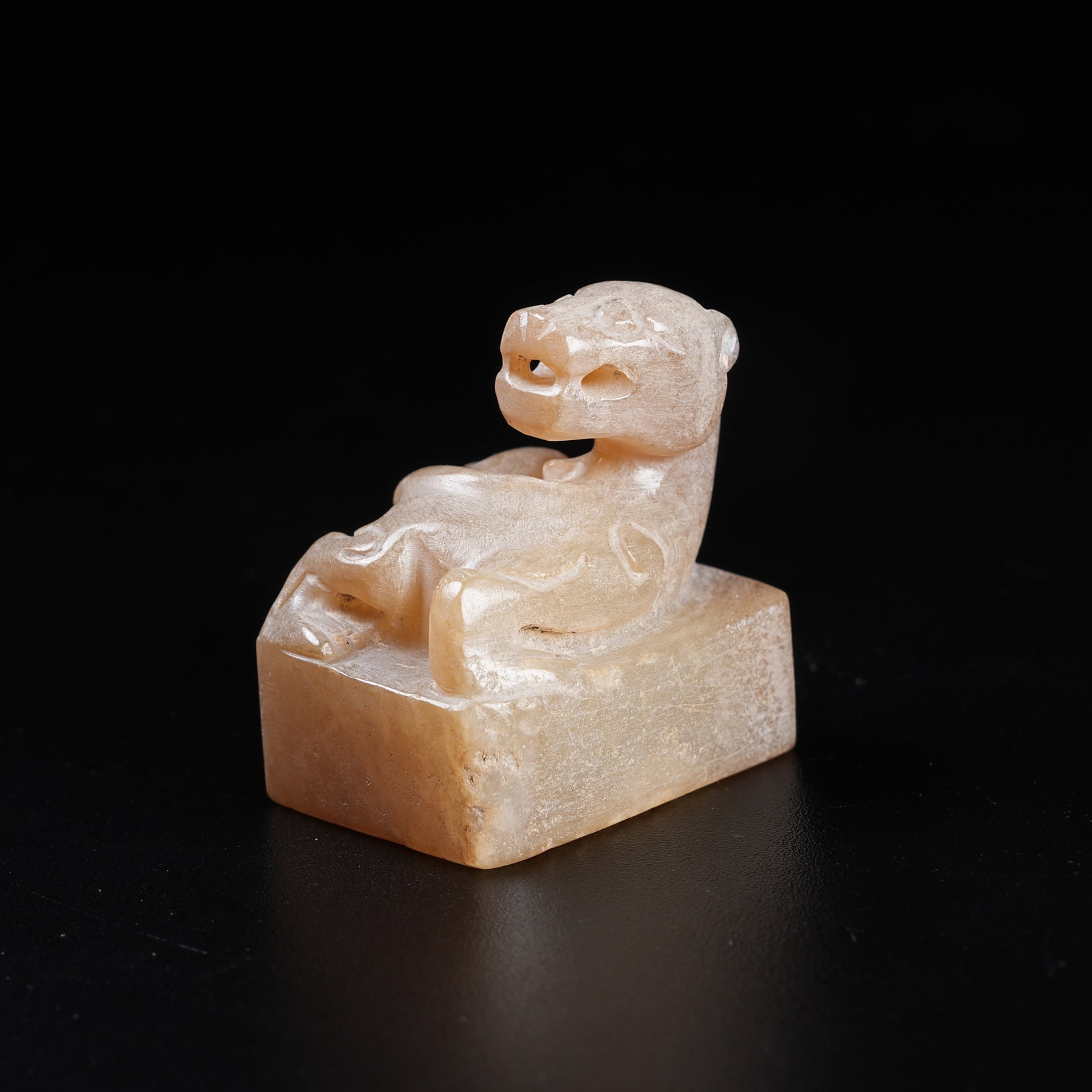 A ARCHAIC JADE SEAL WITH CHI DRAGON KNOB: Archaic Jade Seal with Chi Dragon Knob