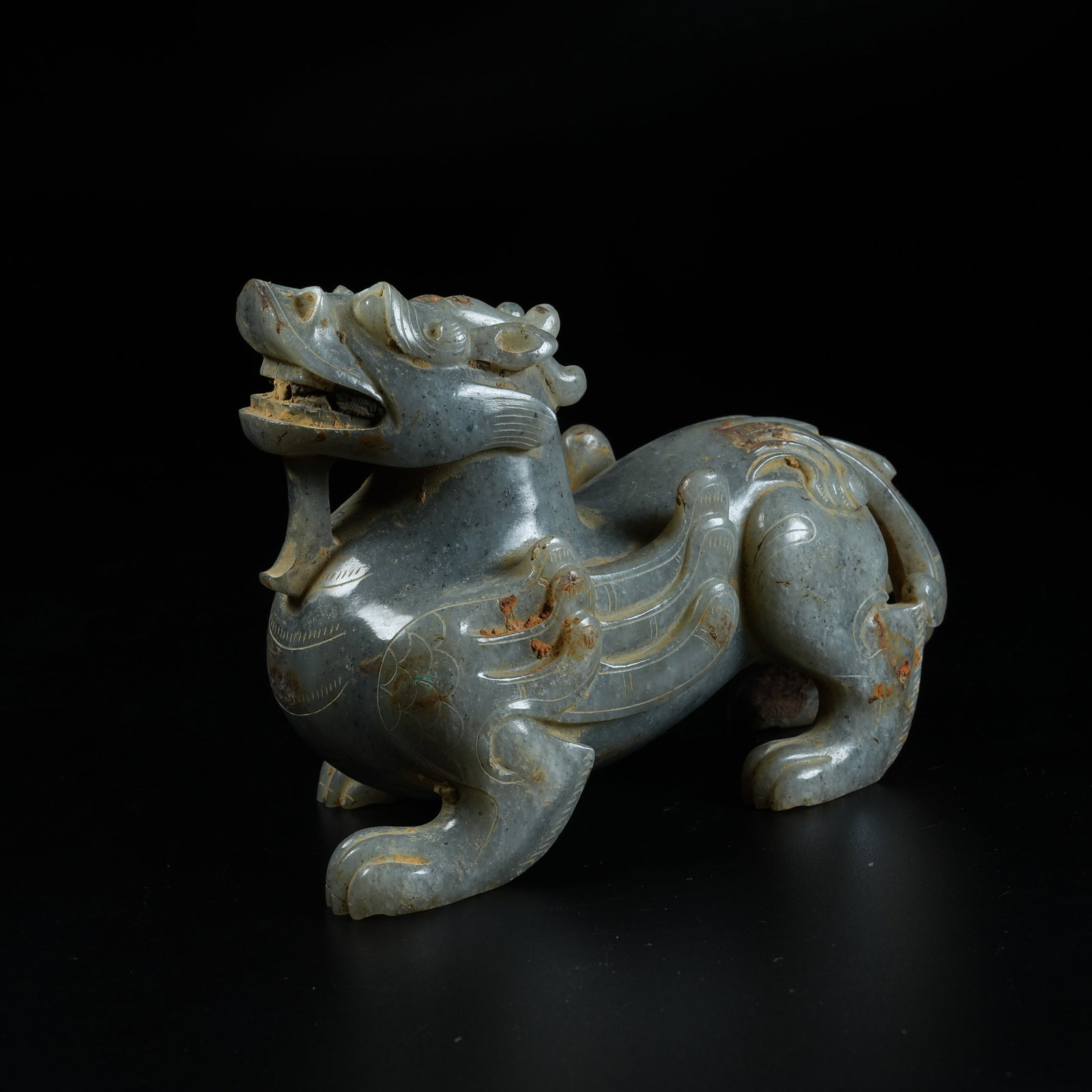 A ANCIENT JADE AUSPICIOUS BEAST ORNAMENT: Ancient Jade Auspicious Beast Ornament