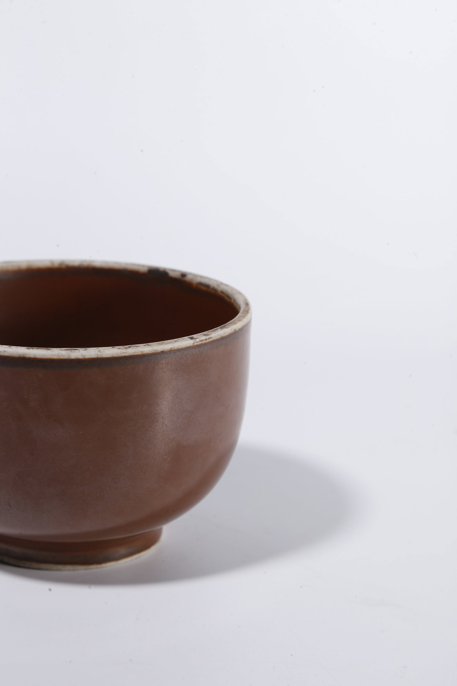 A DING WARE PERSIMMON?GLAZED CUP - 7