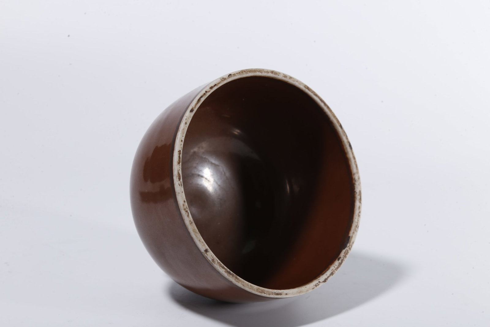A DING WARE PERSIMMON?GLAZED CUP - 8
