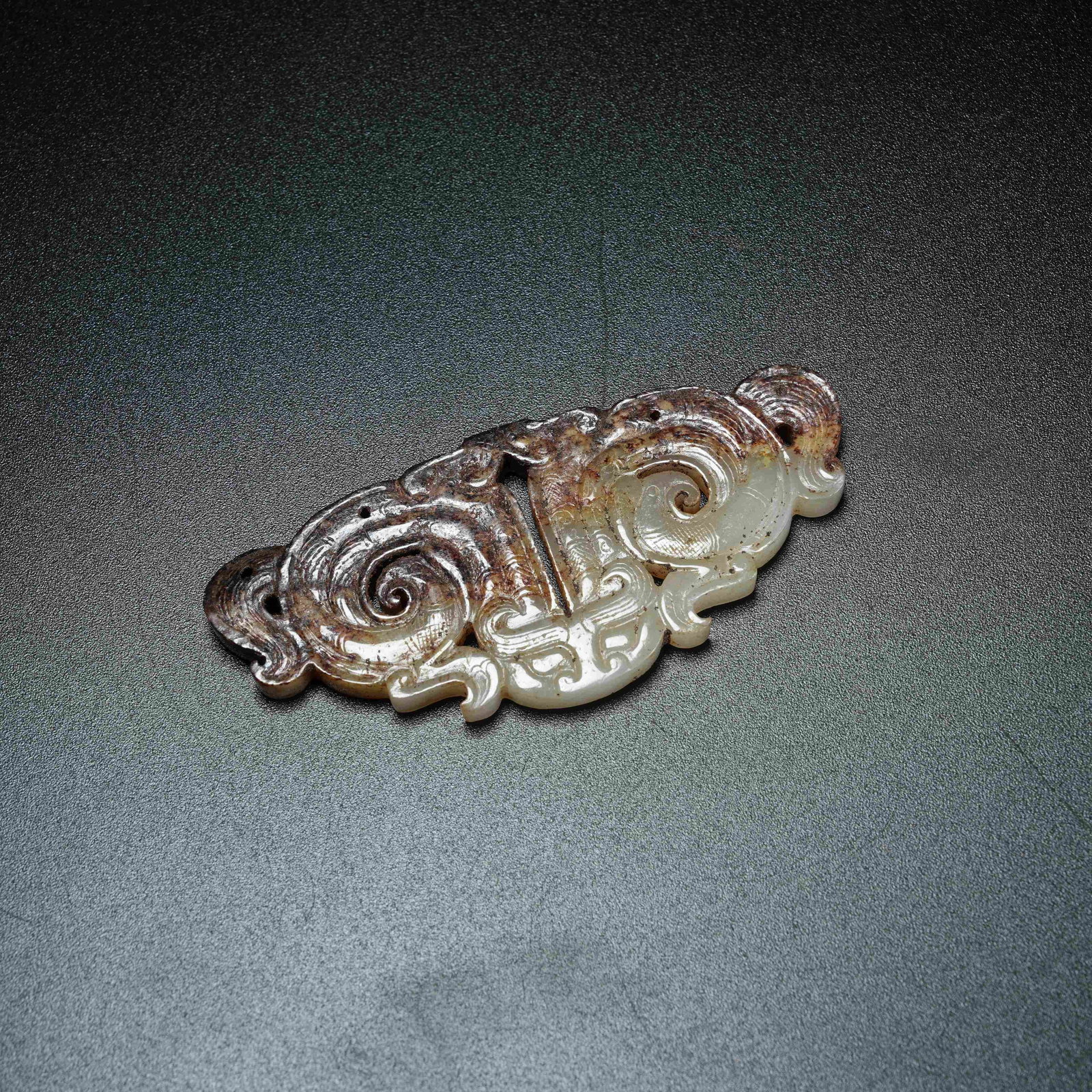 A ANCIENT JADE ASSEMBLED PENDANT WITH DRAGON PATTERN: Ancient Jade Assembled Pendant with Dragon Pattern