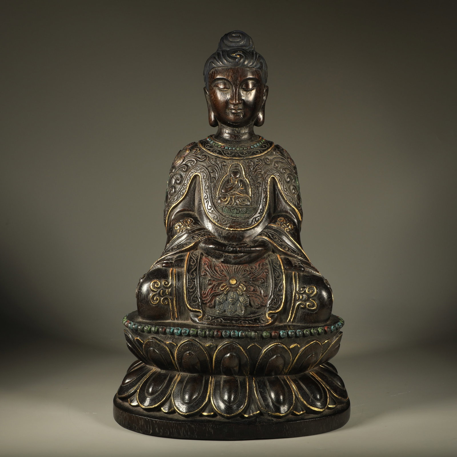 A SEATED CHENXIANG STATUE OF SAKYAMUNI (1 of 7)