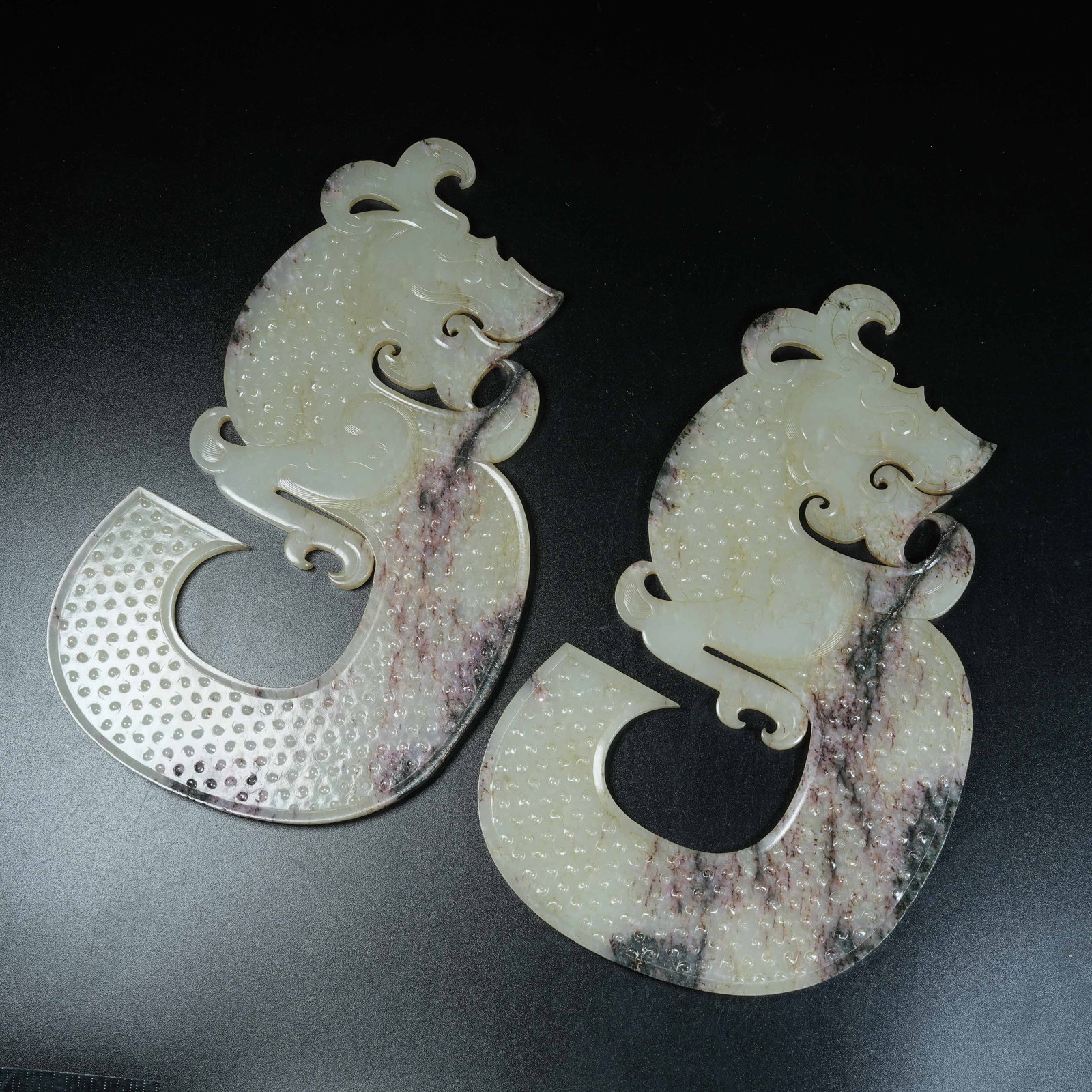 A SET OF ANCIENT JADE S-SHAPED DRAGON PENDANTS (1 of 7)