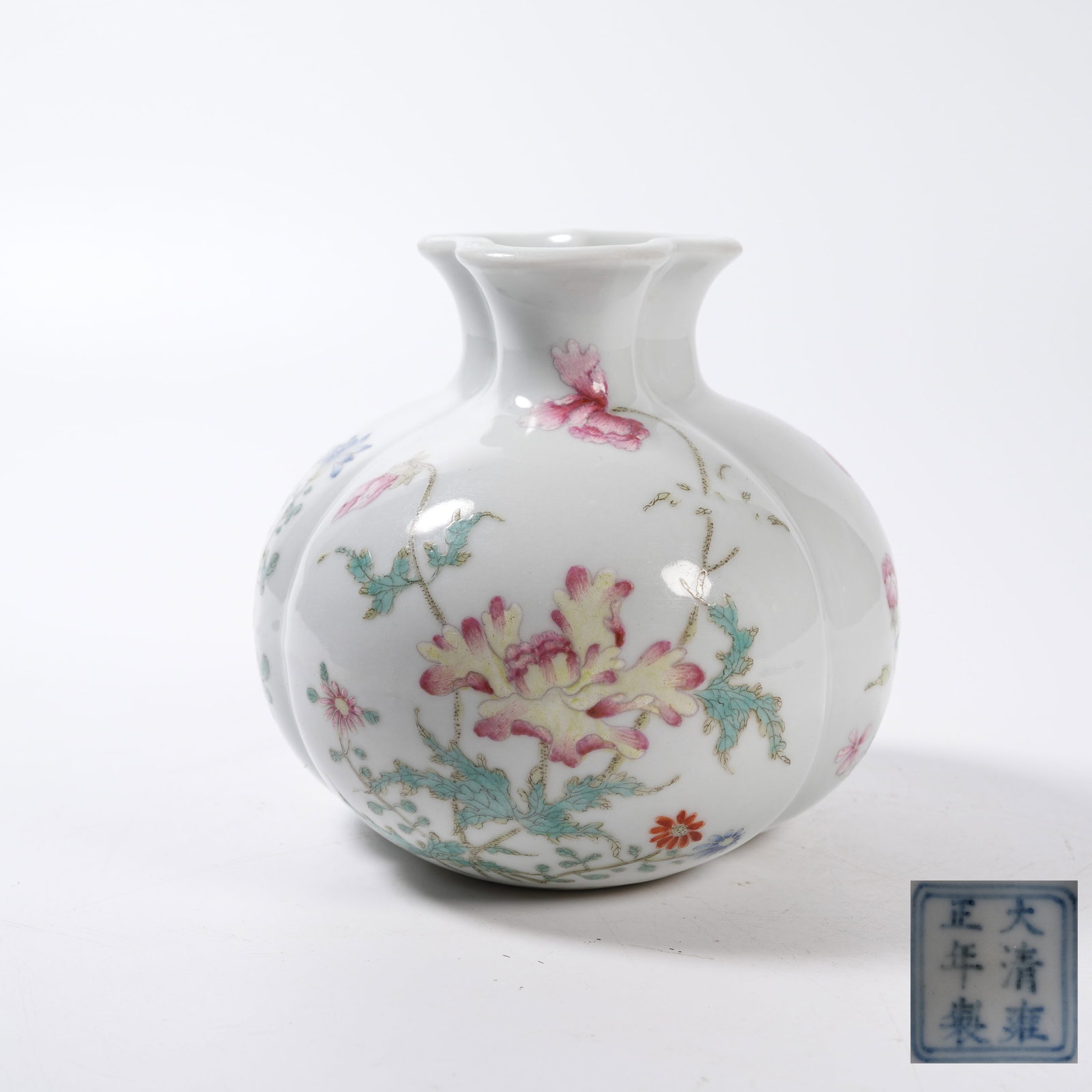 A FAMILLE ROSE POMEGRANATE ZUN WITH FLORAL PATTERN: Famille Rose Pomegranate Zun with Floral Pattern