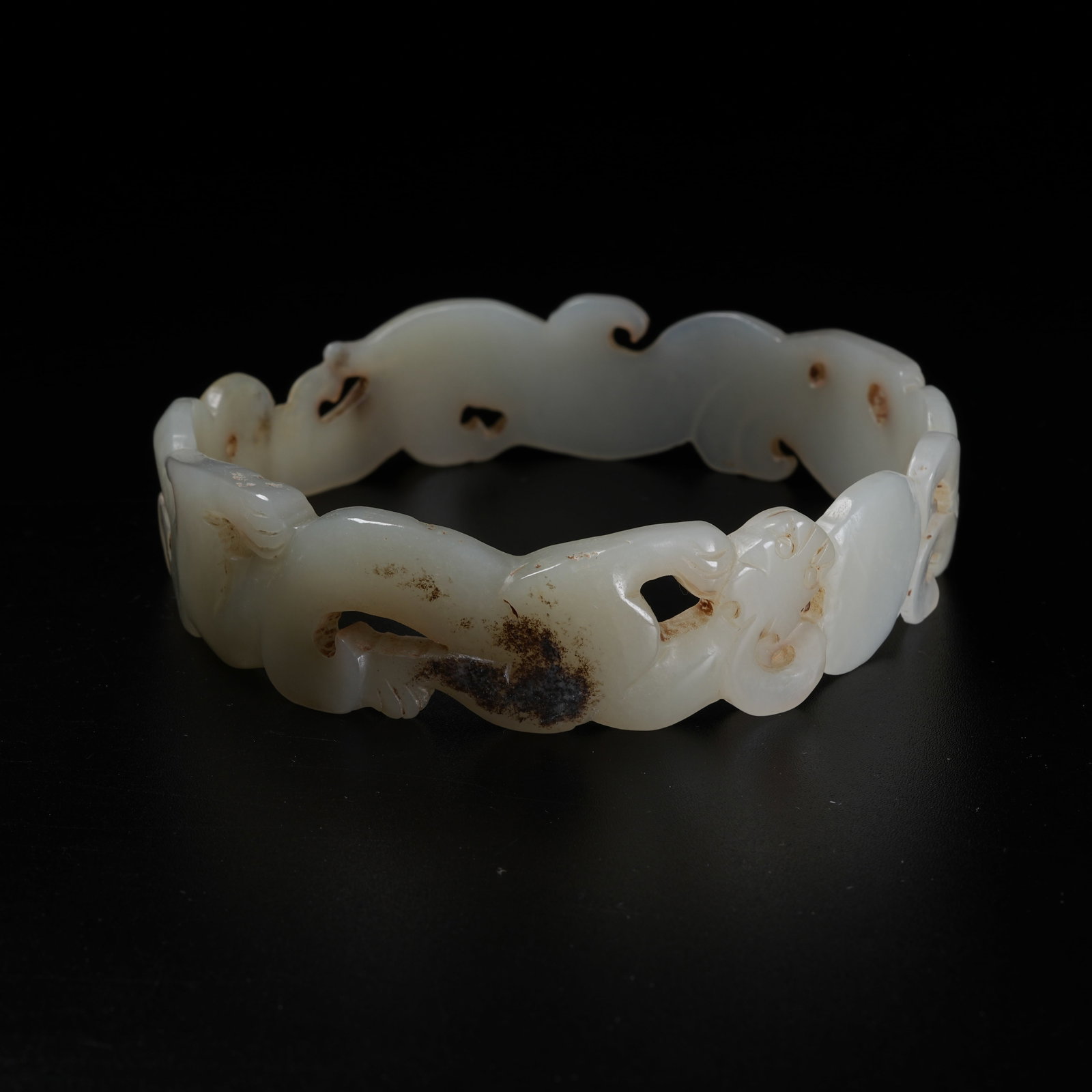 A ARCHAIC JADE BANGLE WITH BEAST PATTERN: Archaic Jade Bangle with Beast Pattern