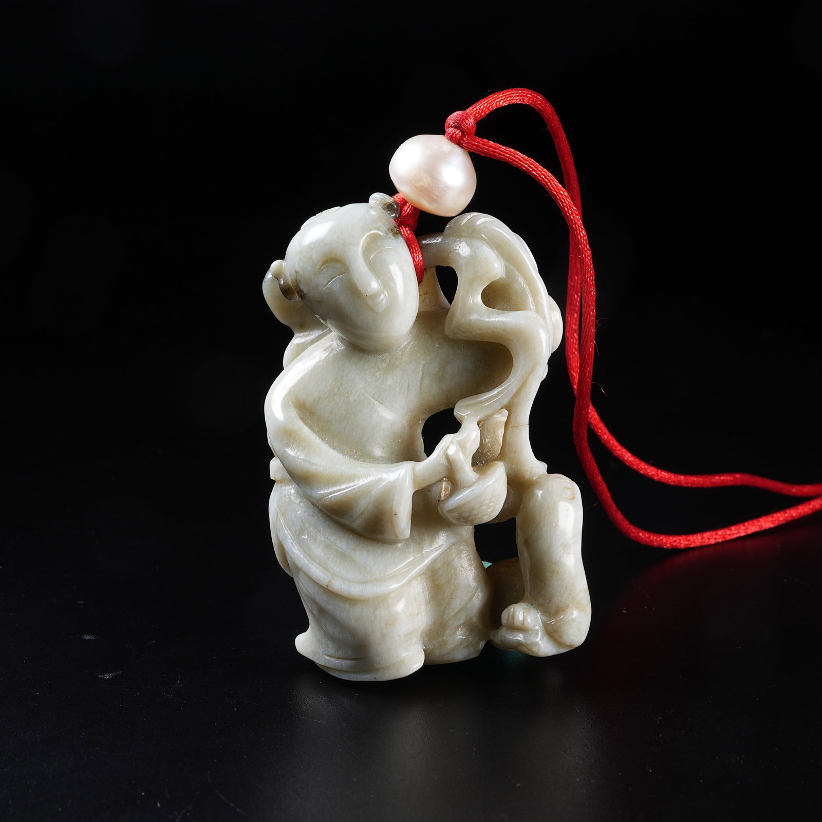 A MEDIEVAL JADE BOY PENDANT: Medieval Jade Boy Pendant