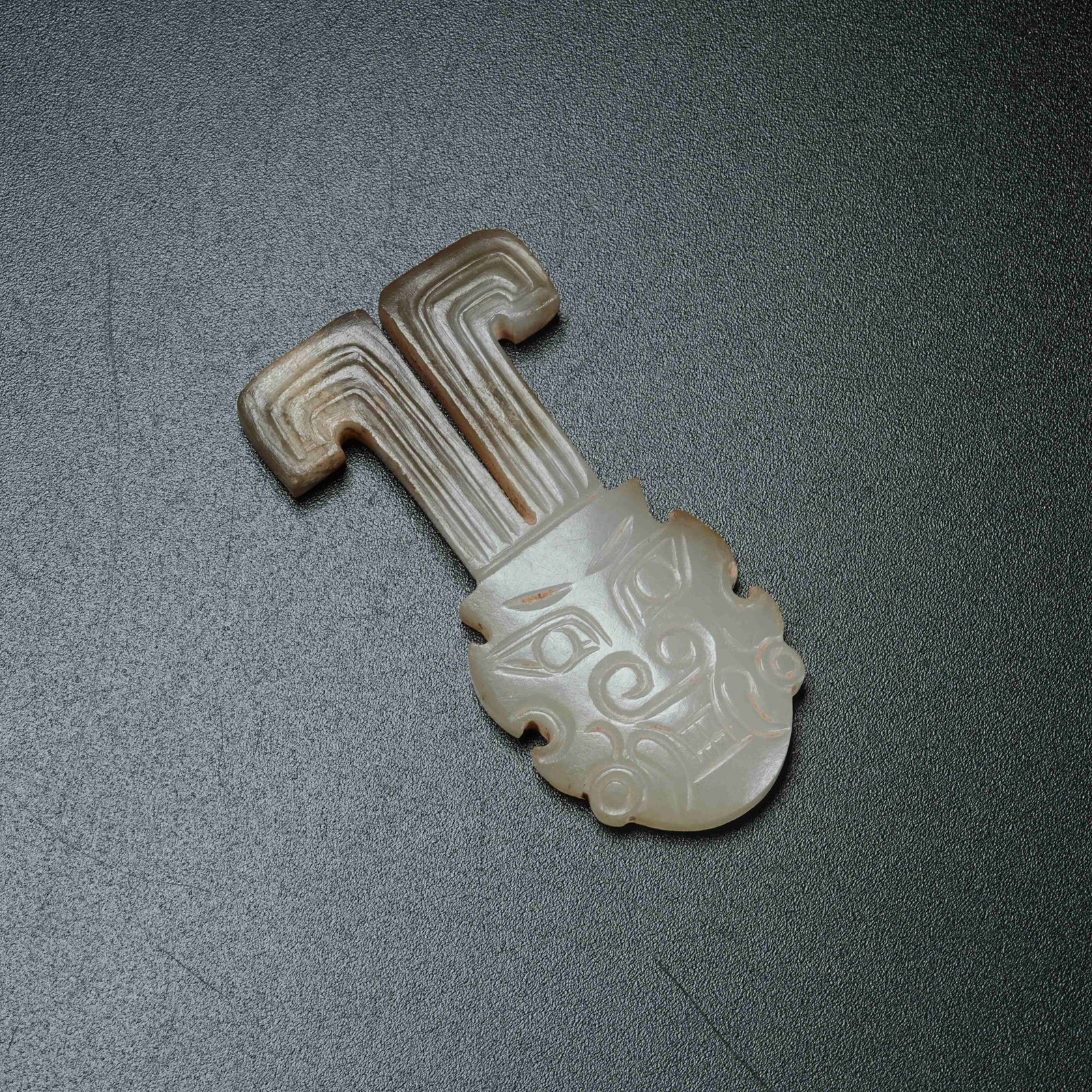 A ANCIENT JADE DIVINE FIGURE BELT ORNAMENT: Ancient Jade Divine Figure Belt Ornament