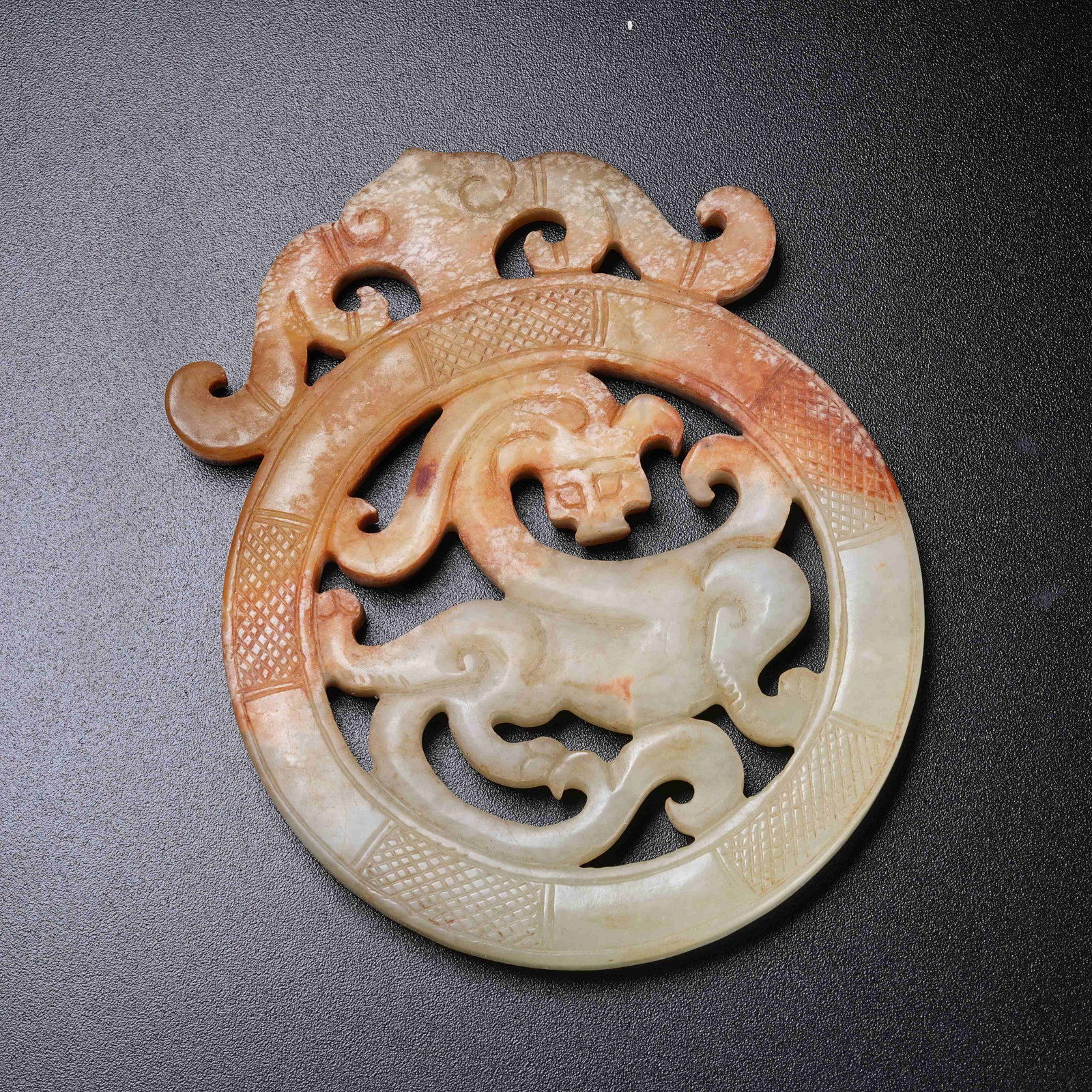 A ARCHAIC JADE OPENWORK BI CARVED WITH CHI DRAGONS: Archaic Jade Openwork Bi Carved with Chi Dragons