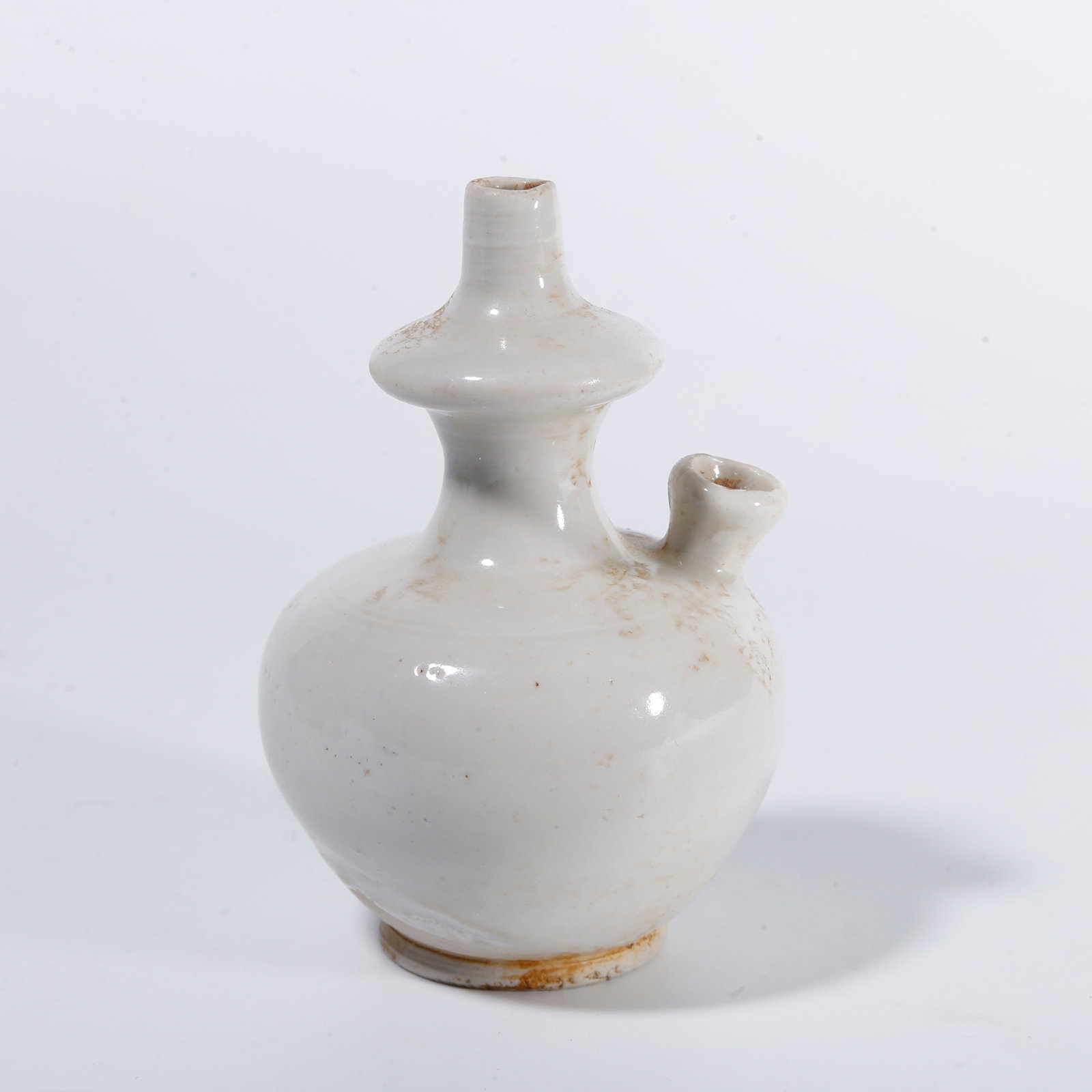 A DING WARE RITUAL WATER BOTTLE: Ding ware ritual water bottle