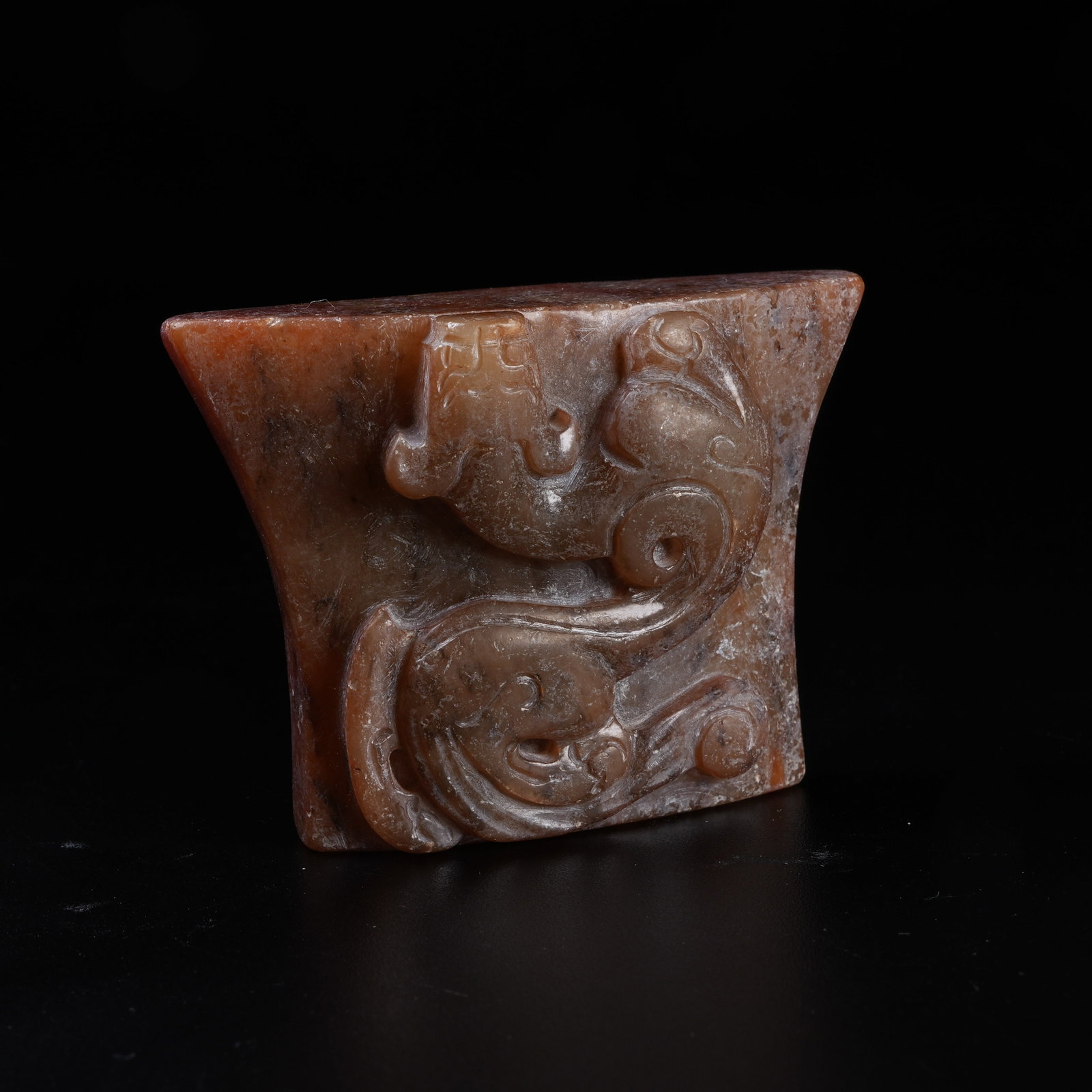 A ARCHAIC JADE SWORD POMMEL WITH CHI DRAGON PATTERN: Archaic Jade Sword Pommel with Chi Dragon Pattern
