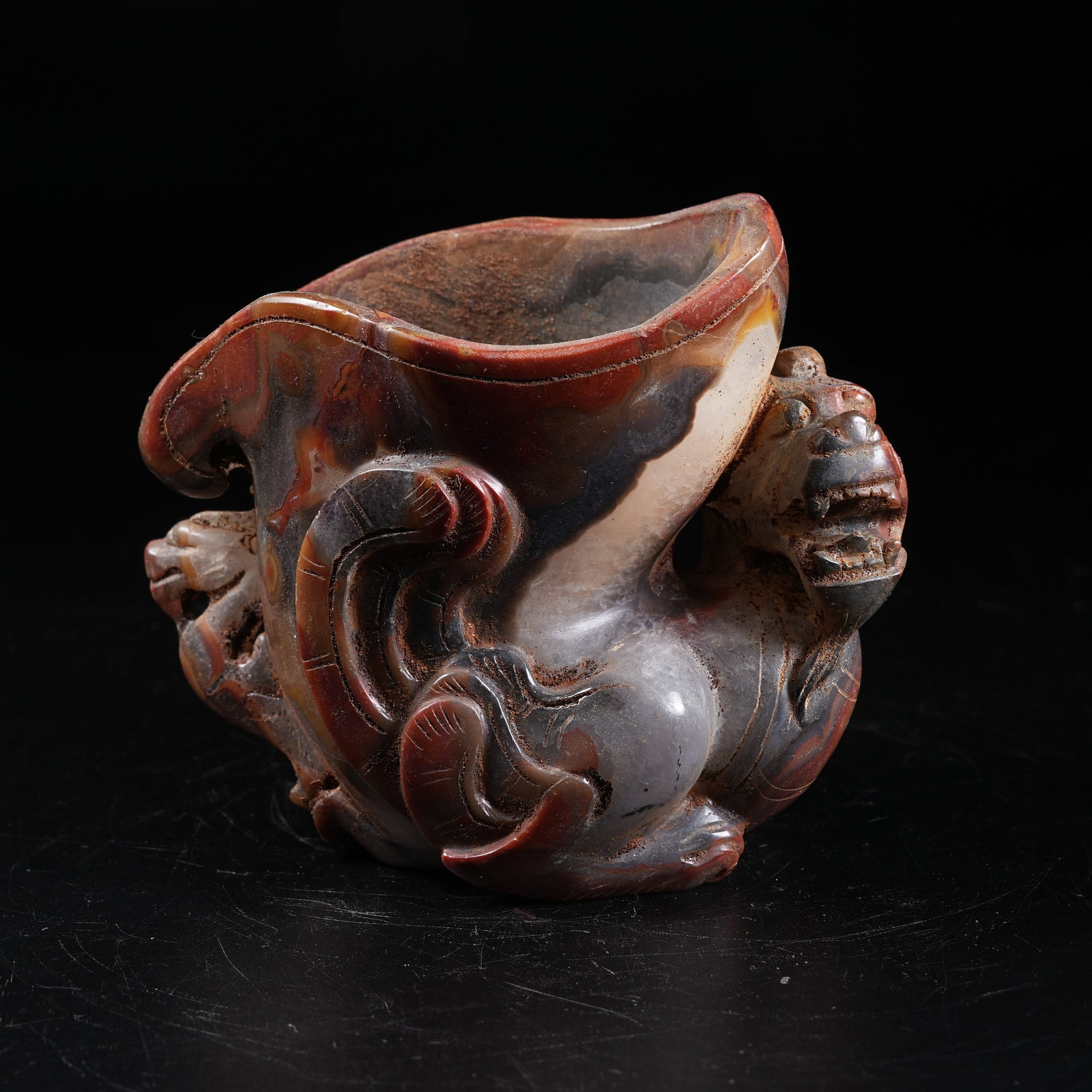 A WARRING STATES RED AGATE CHI DRAGON HORN CUP (1 of 9)