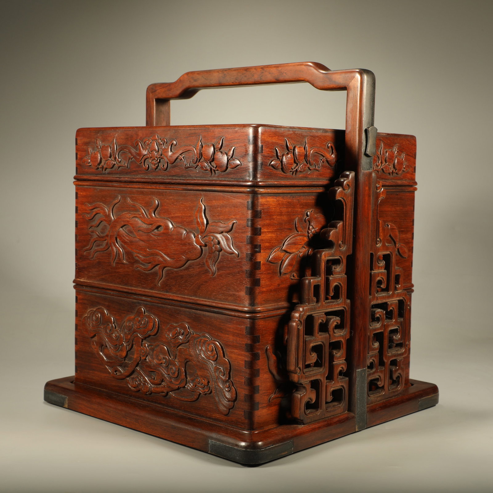 A HUANGHUALI CARRYING BOX CARVED WITH FIVE?BLESSINGS?EMBRACING?LONGEVITY MOTIFS: Huanghuali Carrying Box Carved with Five?blessings?embracing?longevity Motifs